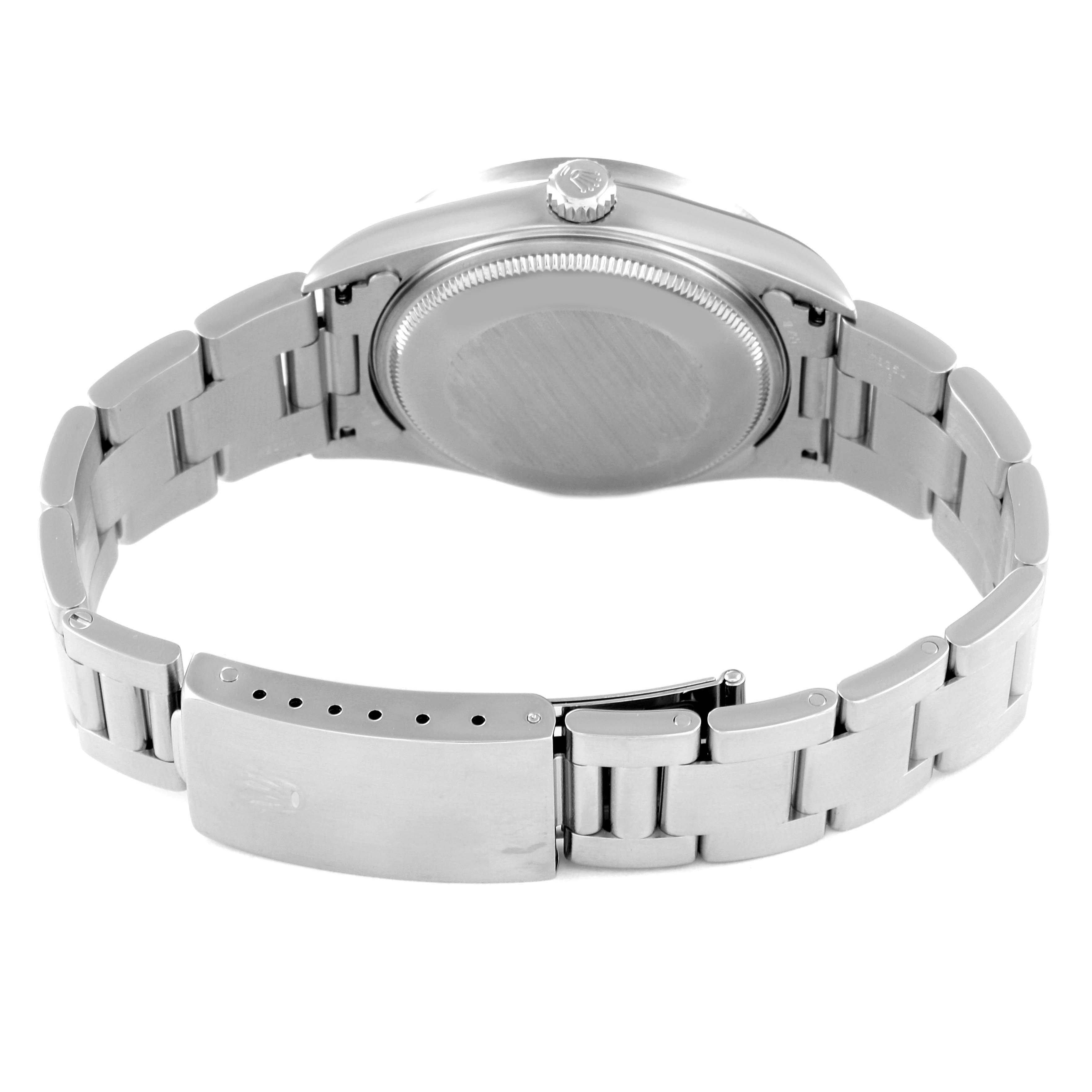 The image shows the back of a Rolex Air-King 14010 Men's Stainless Steel Black Dial 14010 Men's Stainless Steel Black Dial watch, highlighting the case back, crown, and bracelet with clasp.