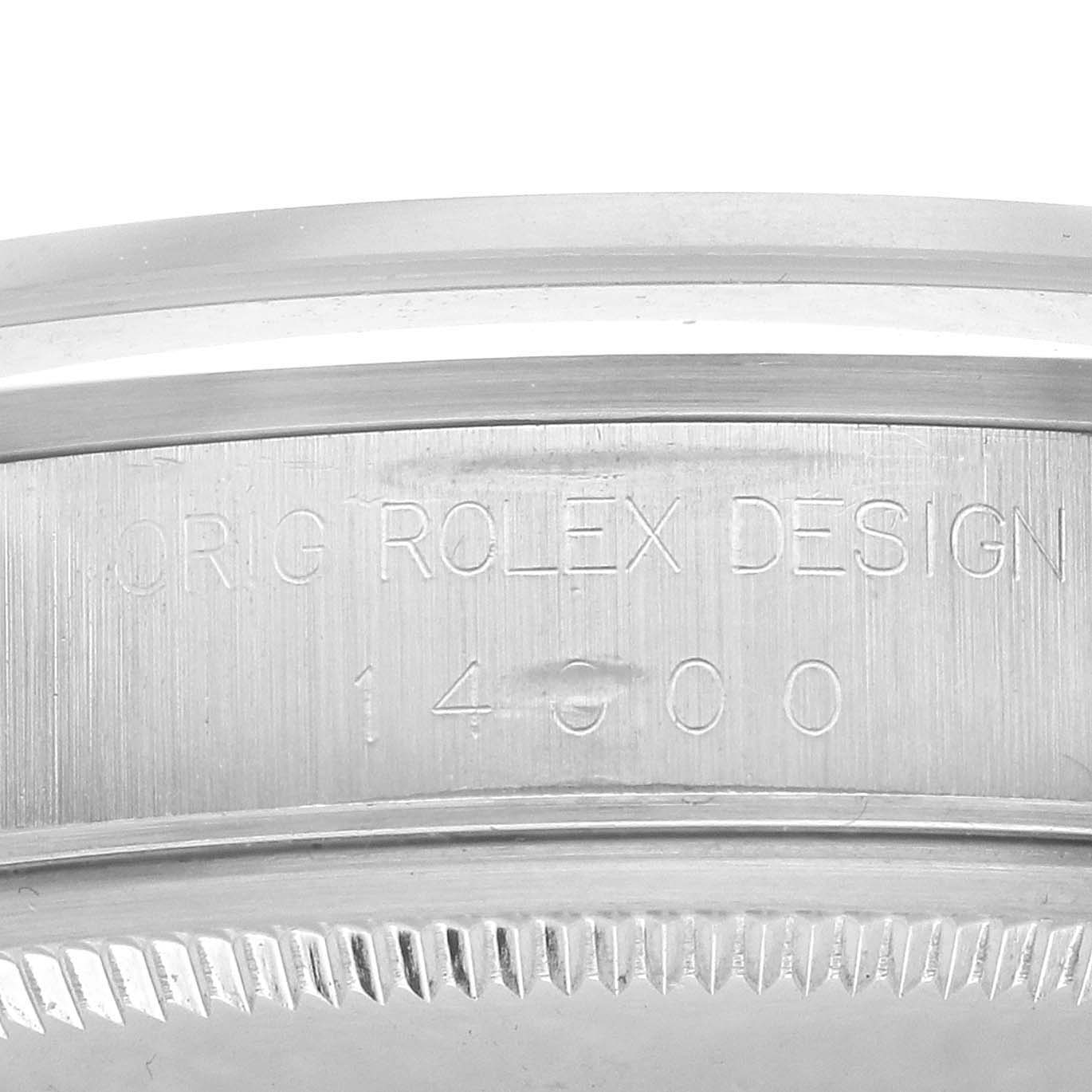 The image shows a close-up side view of the bezel and case of the Rolex Air-King 14000 Men's Stainless Steel Silver Dial watch.