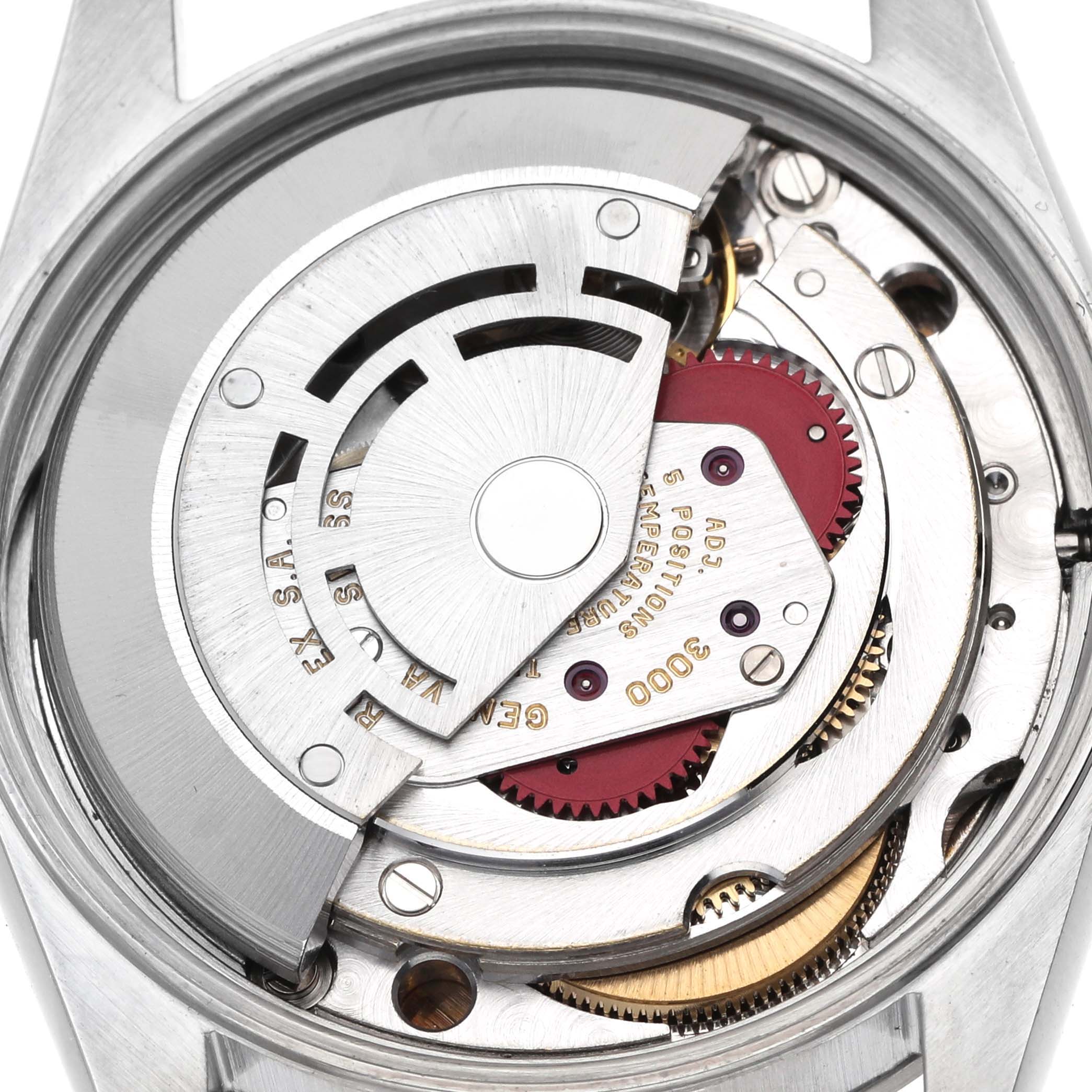 The Rolex Air-King 14000 Men's Stainless Steel Silver Dial watch is shown from a rear angle, revealing its intricate movement and rotor components.