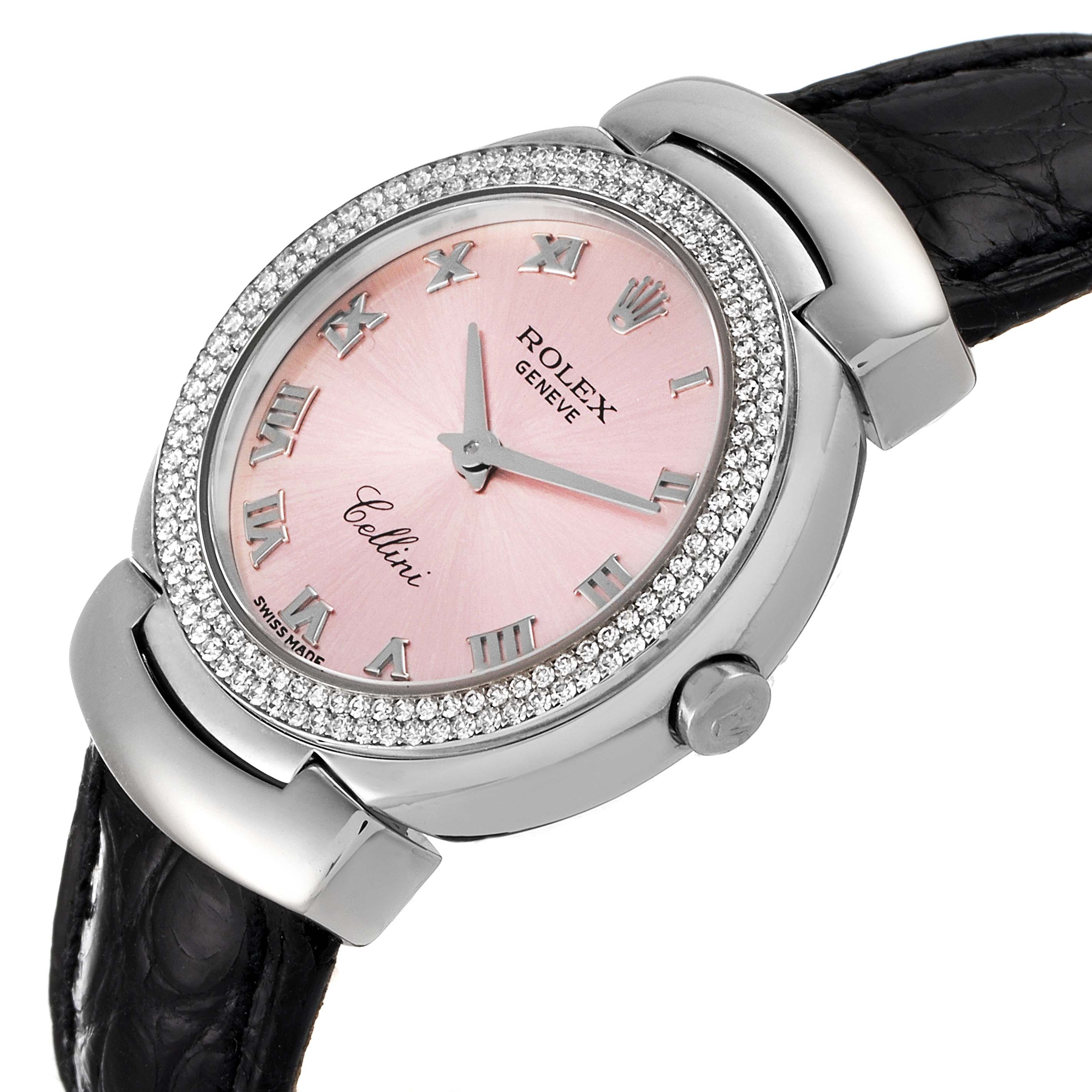 The Rolex Cellini 6671 Women's White Gold Pink Dial 6671 Women's White Gold Pink Dial watch is shown at an oblique angle, highlighting its pink dial, Roman numerals, diamond bezel, and black leather strap.