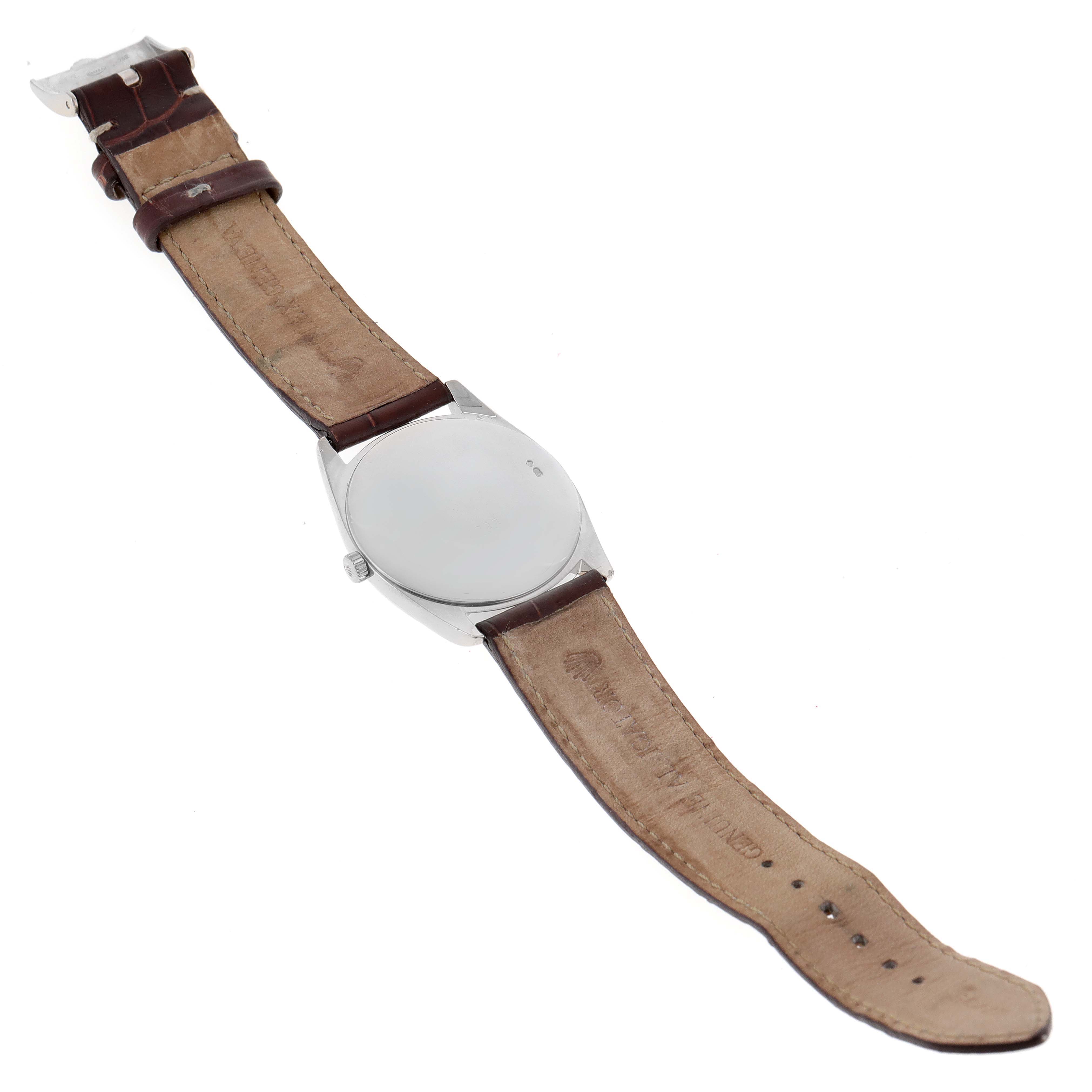 The image shows the back side and leather strap of a Rolex Cellini 4233 Men's White Gold Black Dial 4233 Men's White Gold Black Dial watch, taken from an overhead angle.