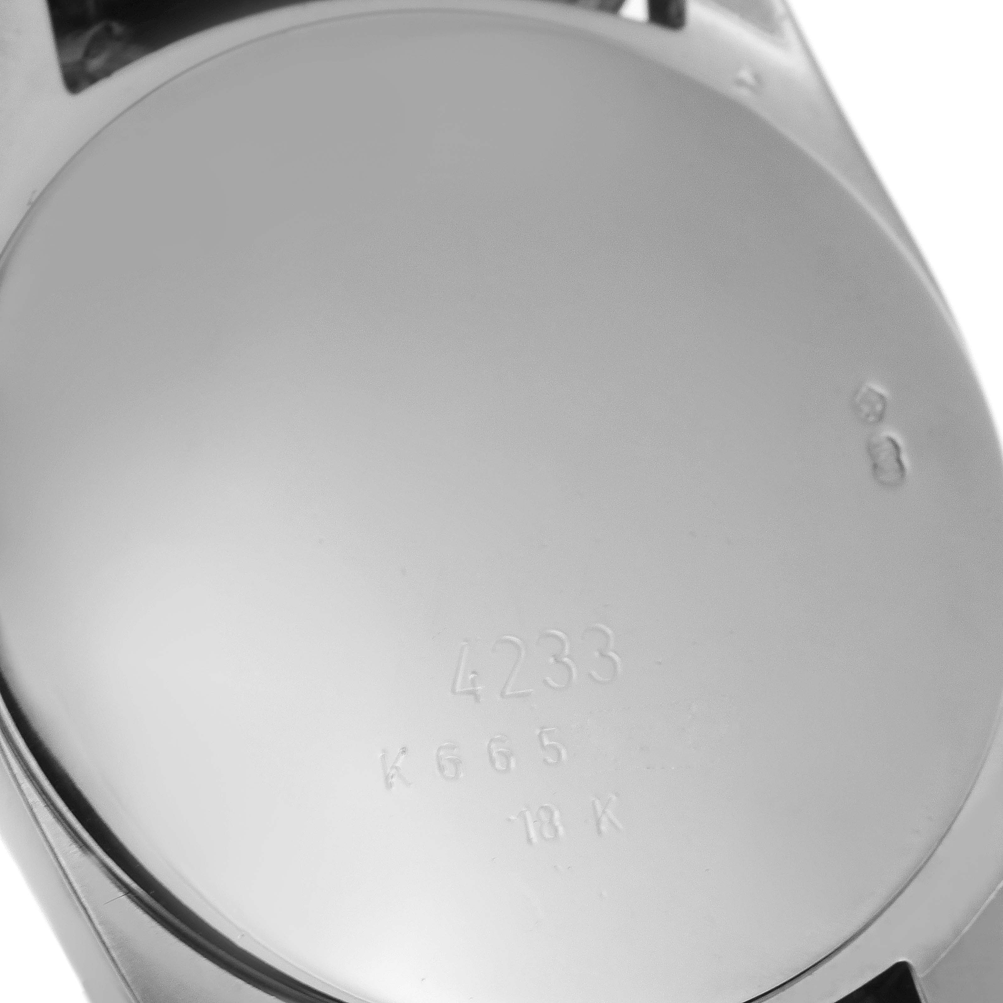 The image shows the back case of a Rolex Cellini 4233 Men's White Gold Black Dial 4233 Men's White Gold Black Dial watch, viewed from a close-up angle.