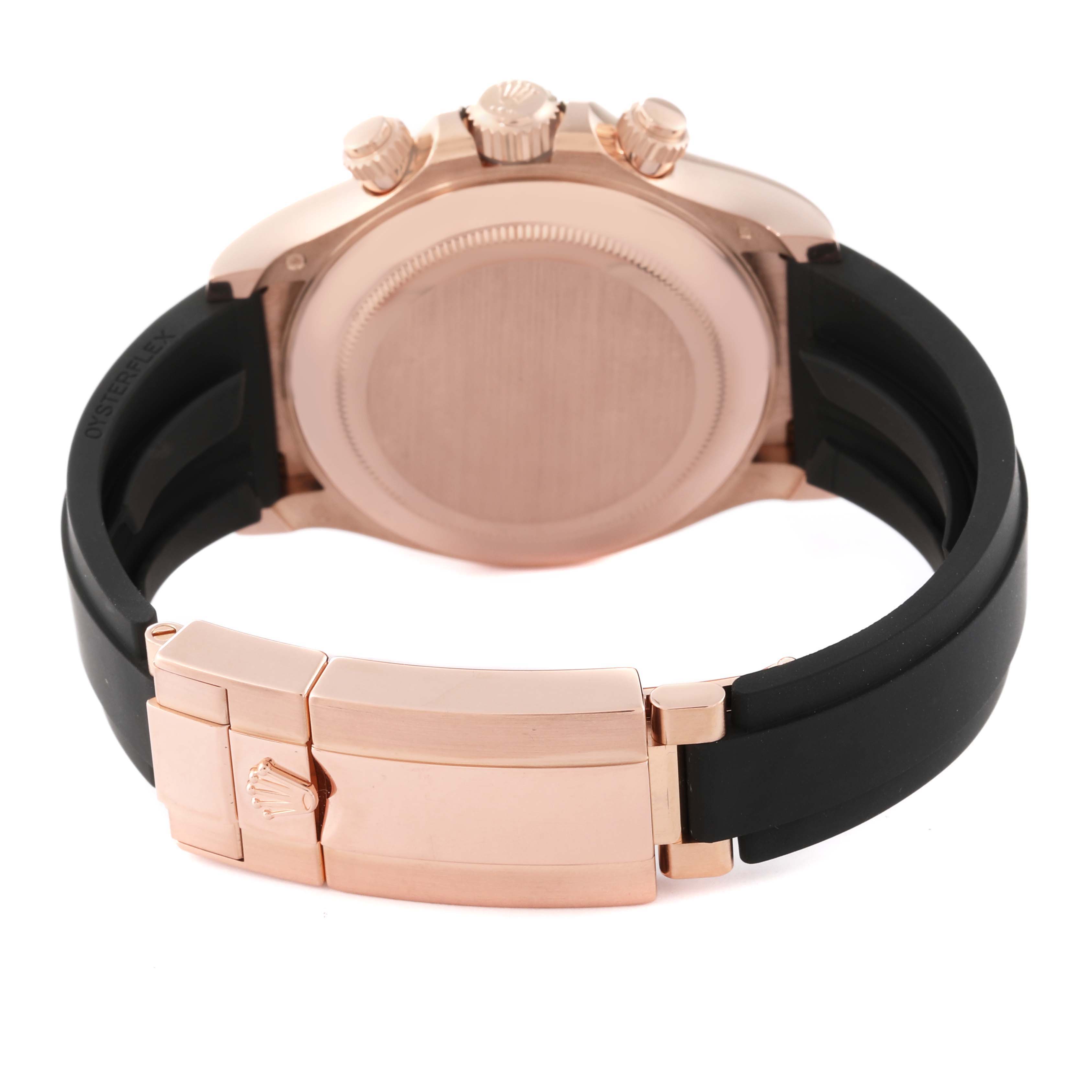 The image shows the back case, clasp, and crown side of the Rolex Daytona 116515 Men's Rose Gold Black Dial 116515 Men's Rose Gold Black Dial watch with a black strap.