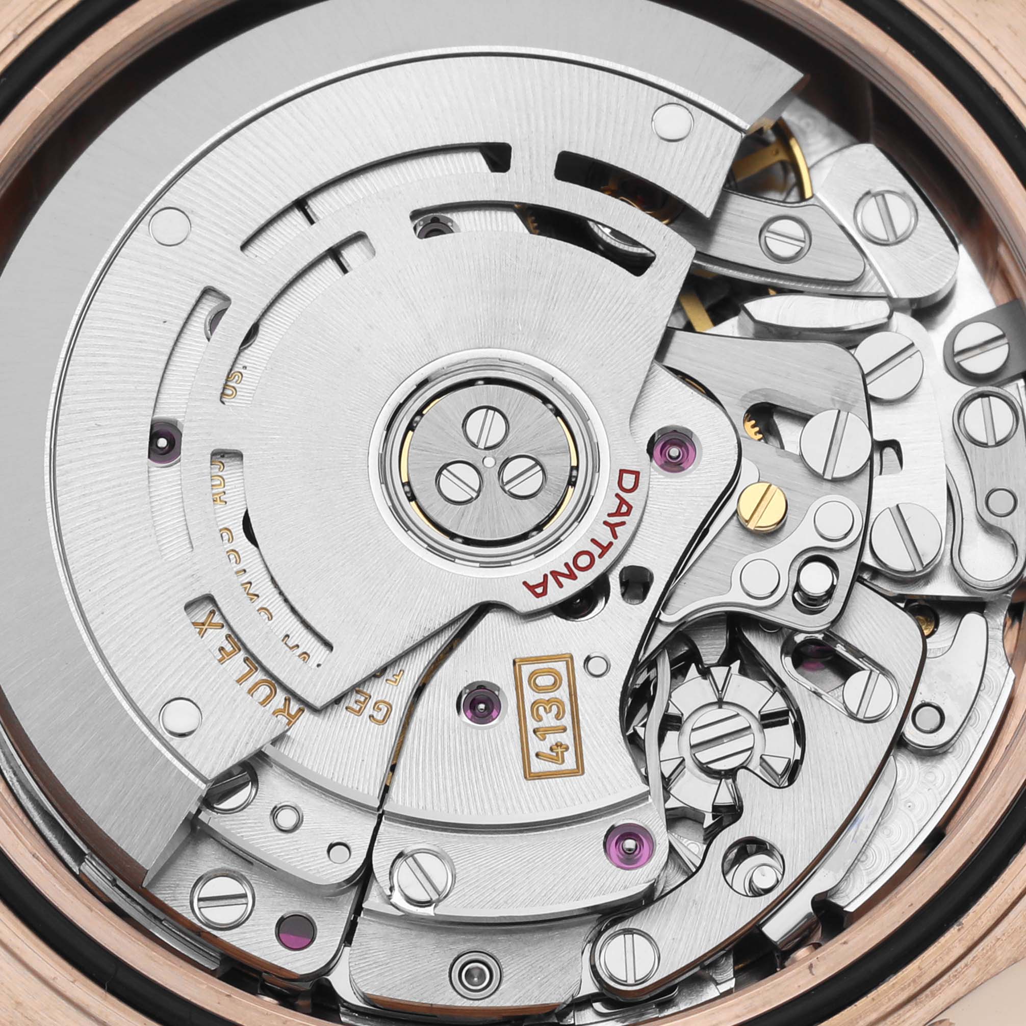 This image shows the detailed internal mechanism of a Rolex Daytona 116515 Men's Rose Gold Black Dial 116515 Men's Rose Gold Black Dial watch from a close-up angle.