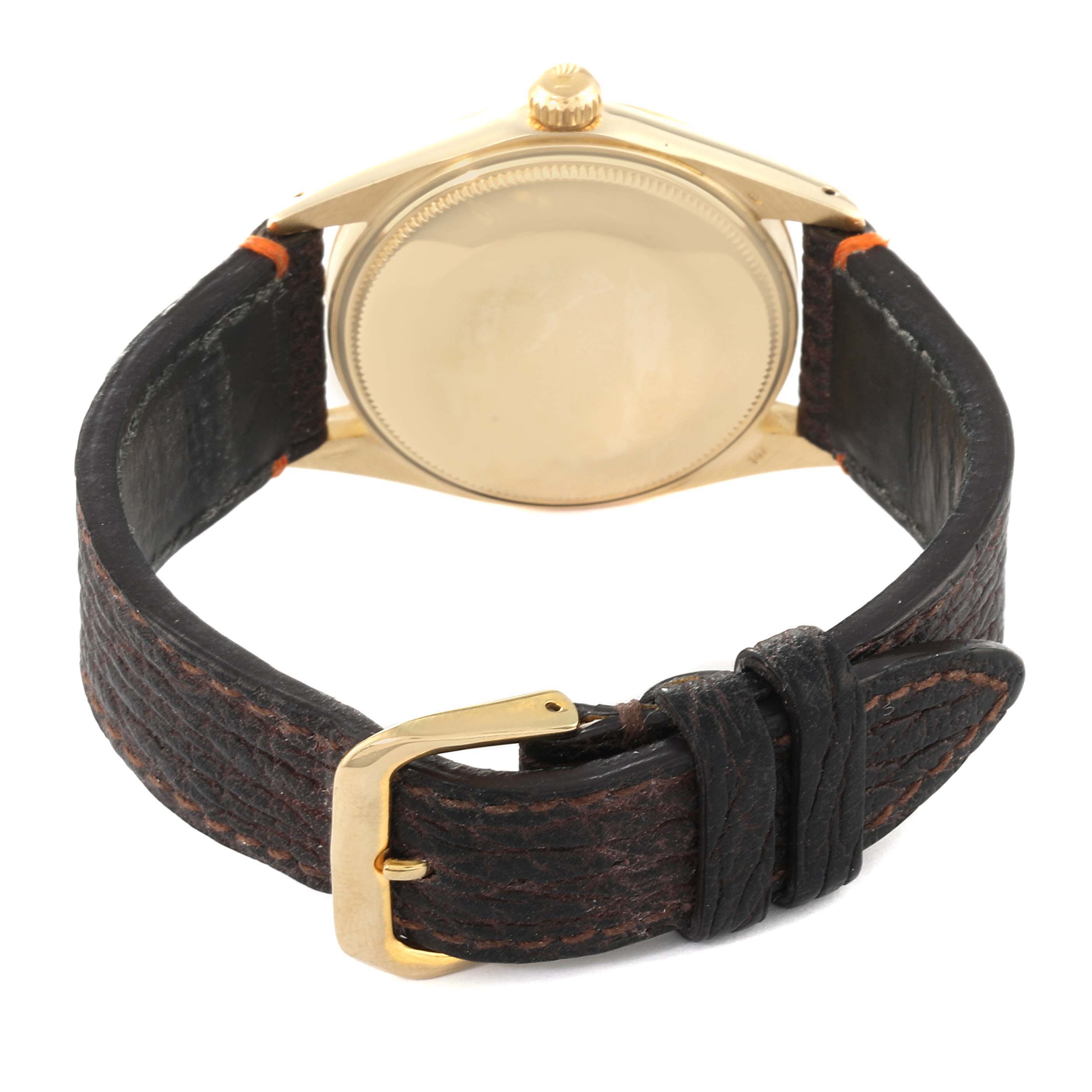 The image shows the back case and leather strap of the Rolex Vintage Collection 1503 Men's Yellow Gold Silver Dial 1503 Men's Yellow Gold Silver Dial watch.