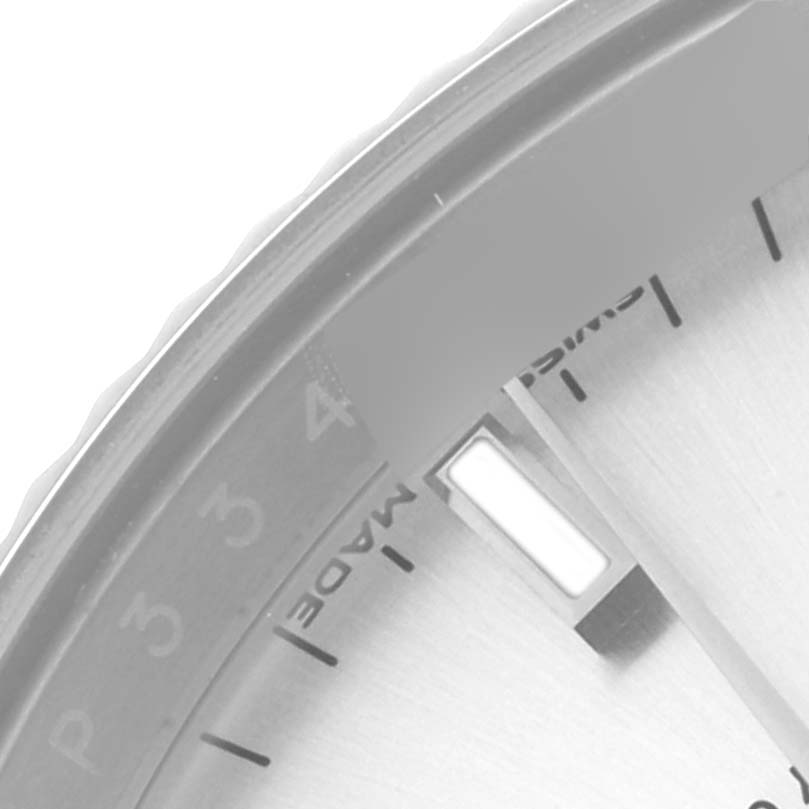 The image shows a close-up of the dial and index markers of a Rolex Date 115234 Men's Stainless Steel Silver Dial 115234 Men's Stainless Steel Silver Dial model watch, highlighting the date display.