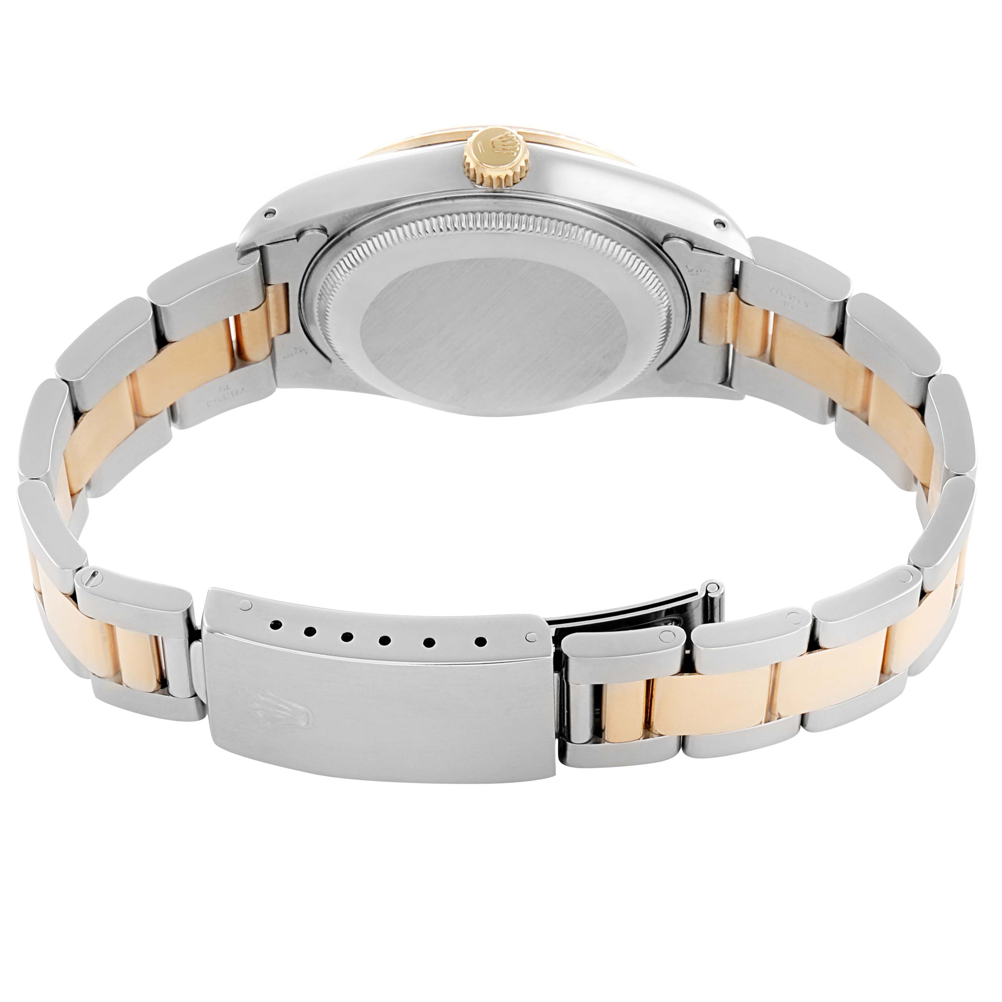 The image shows the back and bracelet of a Rolex Date 15223 Men's Steel and Gold (two tone) Champagne Dial watch, highlighting the clasp and crown.