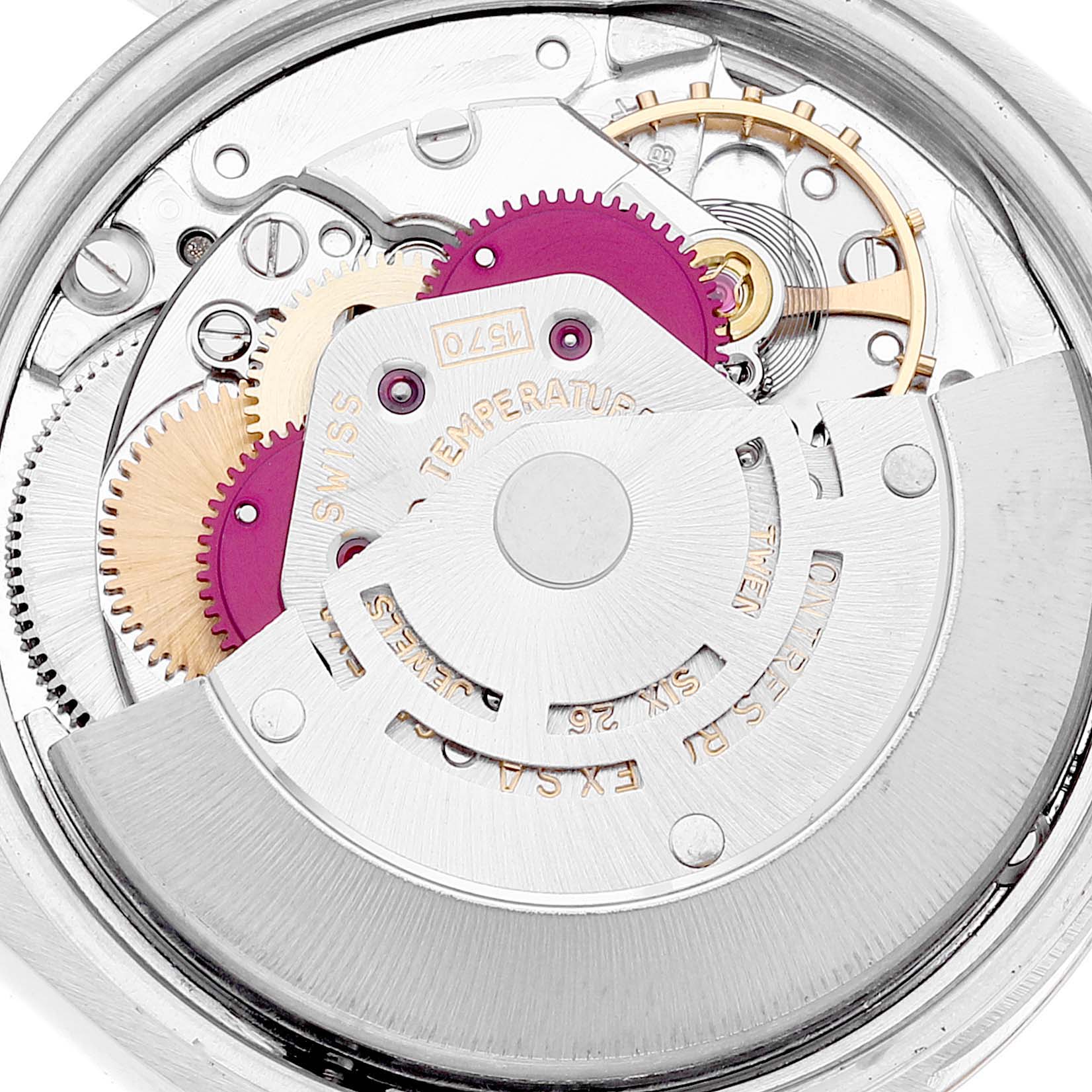 This image shows the internal mechanism of a Rolex Vintage Collection 1505 Men
s Steel and Gold (two tone) Champagne Dial 1505 Men
s Steel and Gold (two tone) Champagne Dial model, focusing on gears and the rotor.