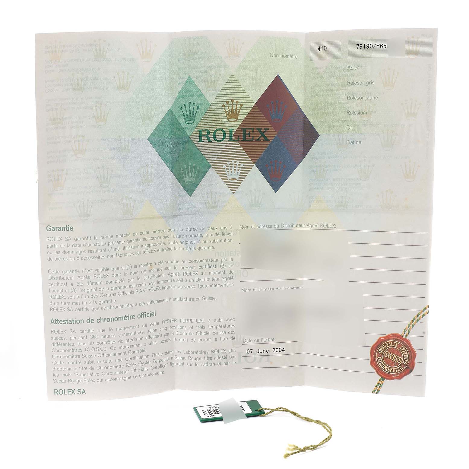 The image shows the warranty and certification documents for a Rolex Date 79190 Women's Stainless Steel White Dial 79190 Women's Stainless Steel White Dial model watch, including a green tag.