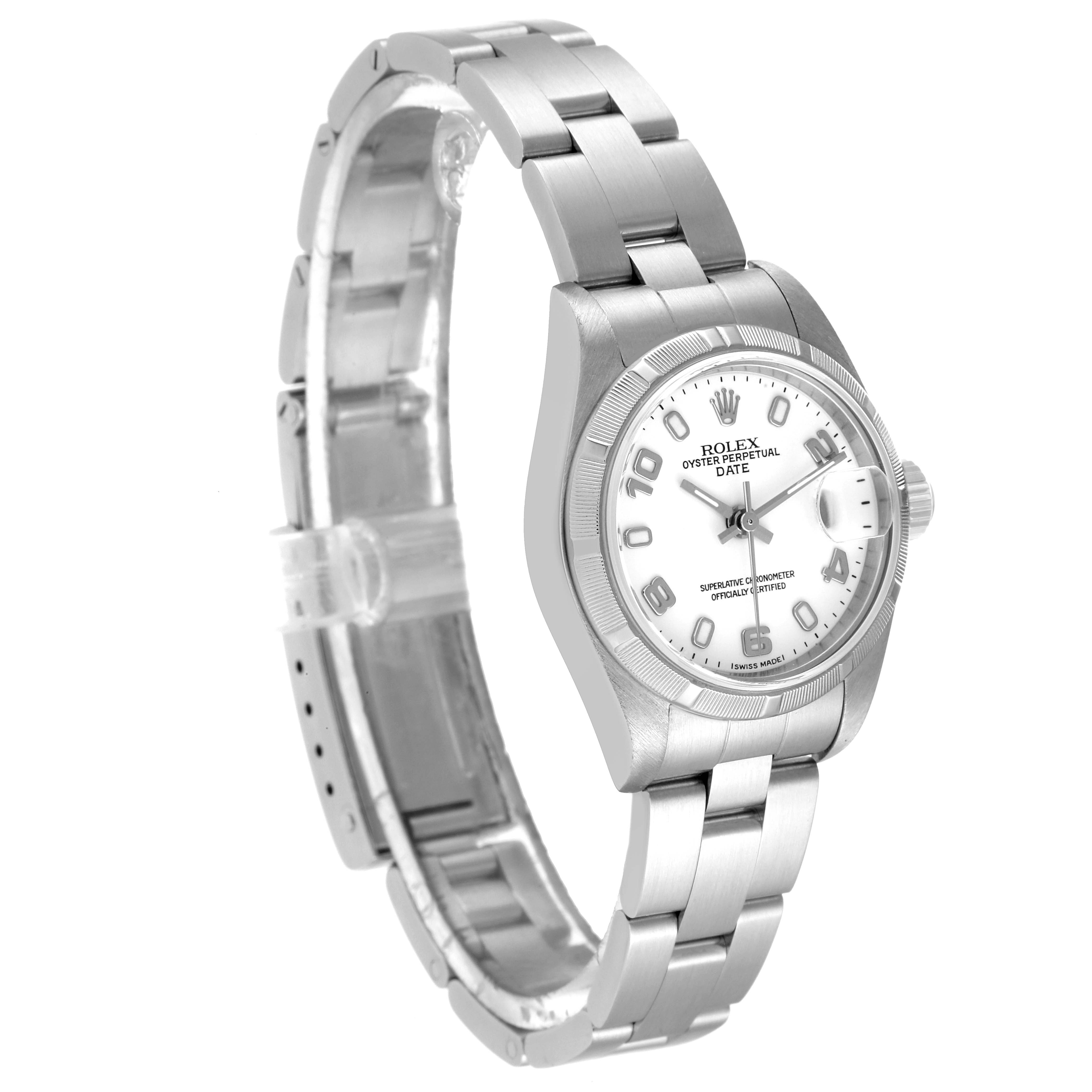 The image shows a side angle view of the Rolex Date 79190 Women's Stainless Steel White Dial 79190 Women's Stainless Steel White Dial model, displaying the silver bracelet, case, and white dial with date window.