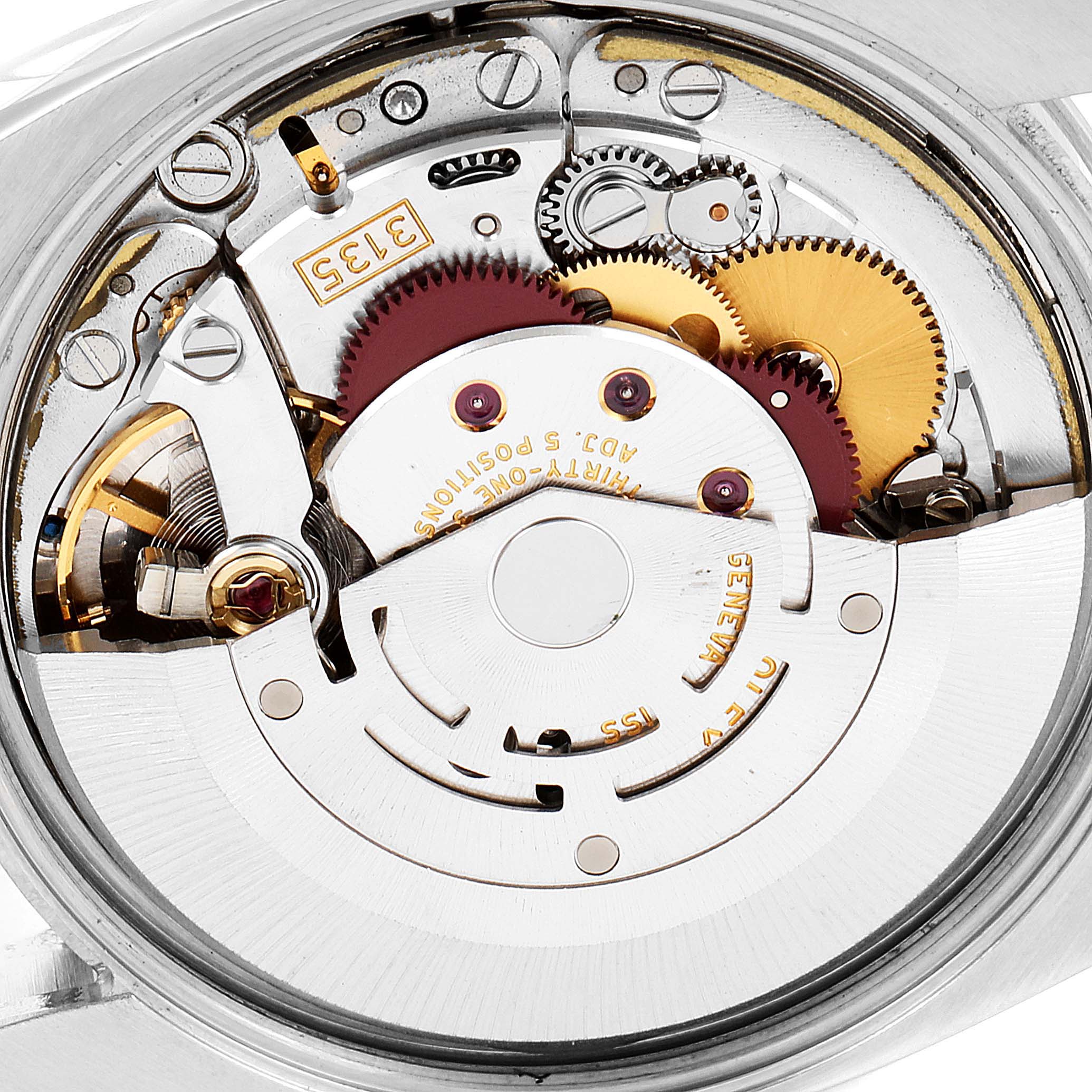 This image shows the internal mechanism and movement of a Rolex Date 115200 Men's Stainless Steel White Dial 115200 Men's Stainless Steel White Dial model watch.