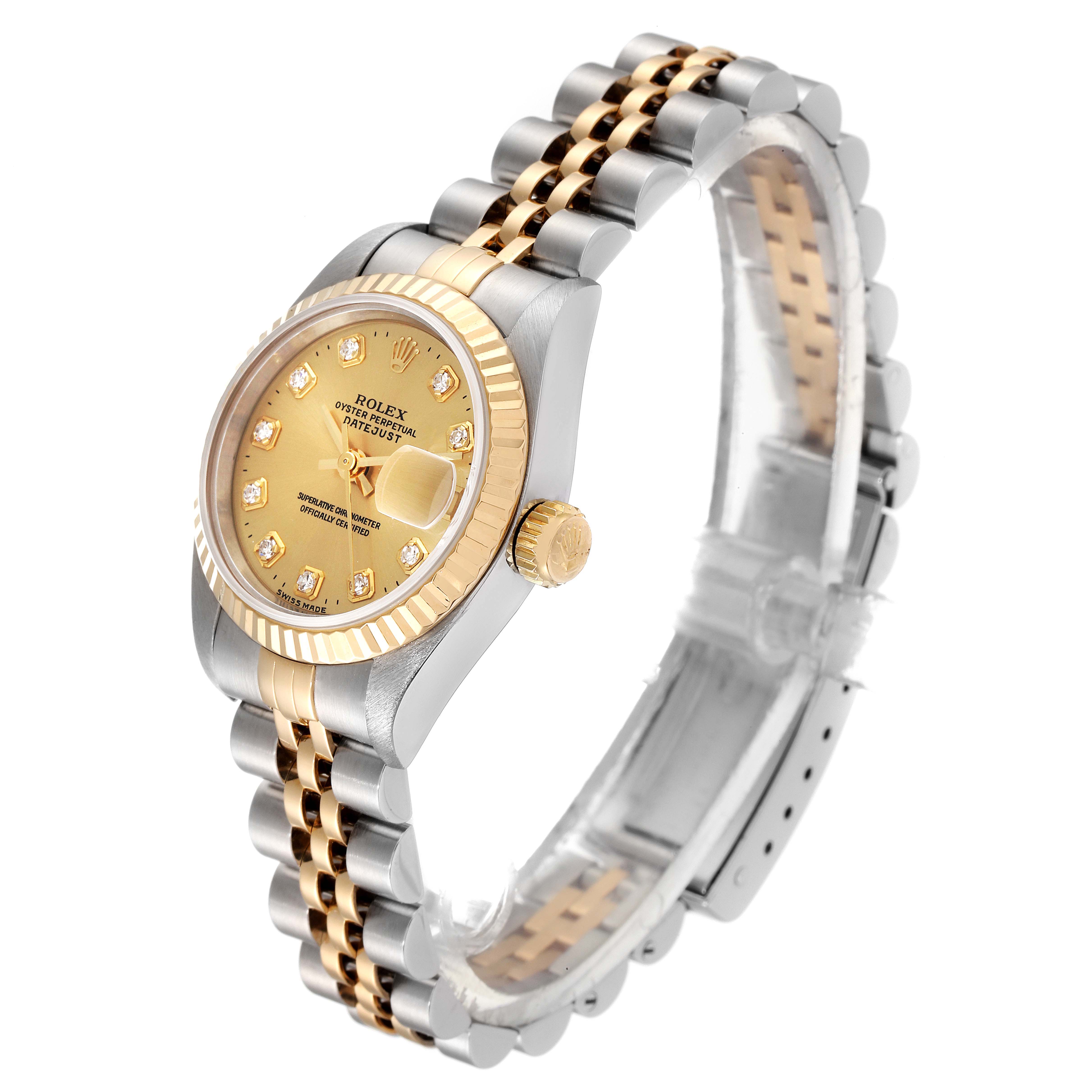 The image shows a Rolex Datejust 69173 Women's Steel and Gold (two tone) Champagne Dial 69173 Women's Steel and Gold (two tone) Champagne Dial watch at a three-quarter angle, highlighting its gold bezel, dial, and bi-color bracelet.