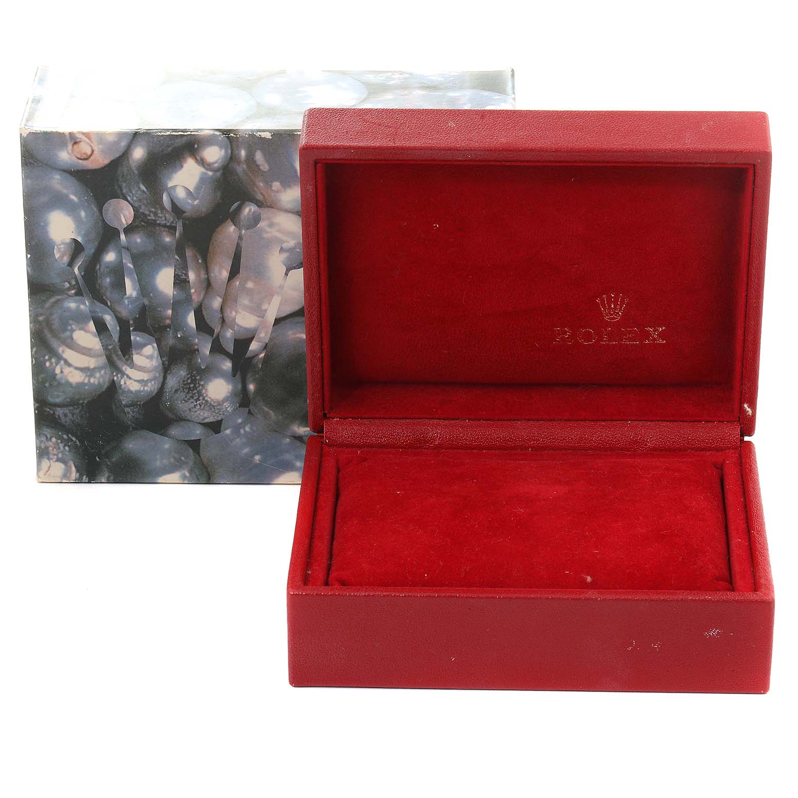 This image shows an empty red Rolex Datejust 69173 Women's Steel and Gold (two tone) Champagne Dial 69173 Women's Steel and Gold (two tone) Champagne Dial watch box with an outer sleeve featuring a decorative design.