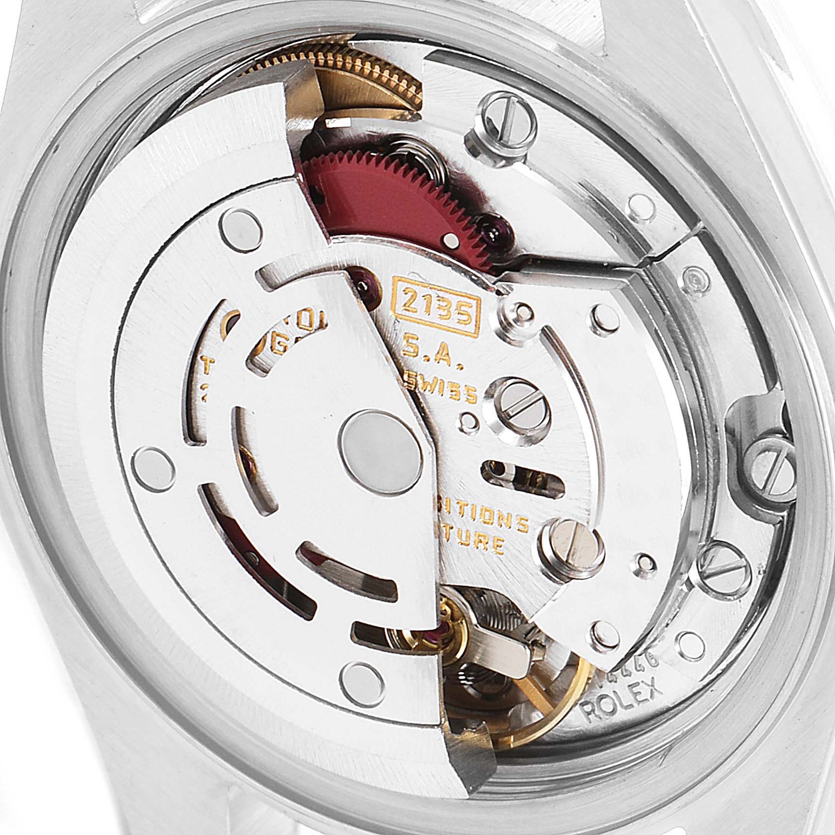 This is a close-up view of the movement mechanism inside a Rolex Datejust 69173 Women's Steel and Gold (two tone) Champagne Dial 69173 Women's Steel and Gold (two tone) Champagne Dial watch, showing gears and internal components.