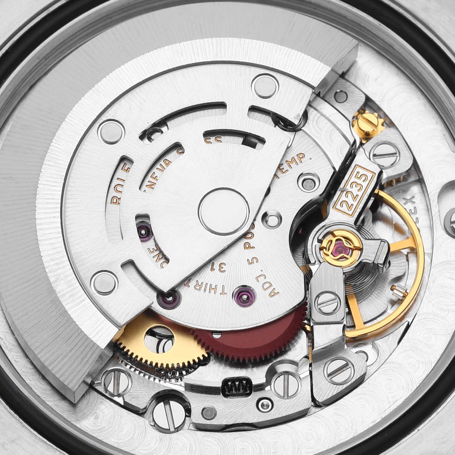 This image shows the internal mechanism of a Rolex Mid-Size 178241 Women's Steel and Gold (two tone) Pink Dial 178241 Women's Steel and Gold (two tone) Pink Dial model from a close-up angle.