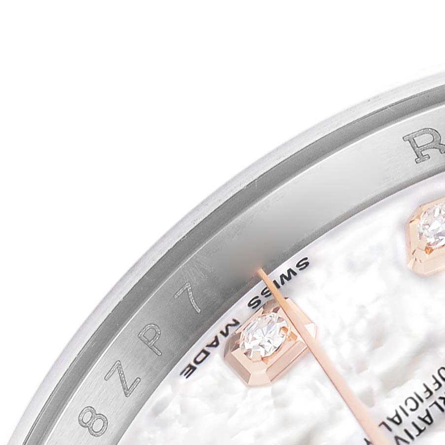 The image shows a close-up of the dial and bezel of a Rolex Datejust 116231 Men's Steel and Gold (two tone) Mother of Pearl Dial watch, highlighting diamond hour markers and part of the minute hand.