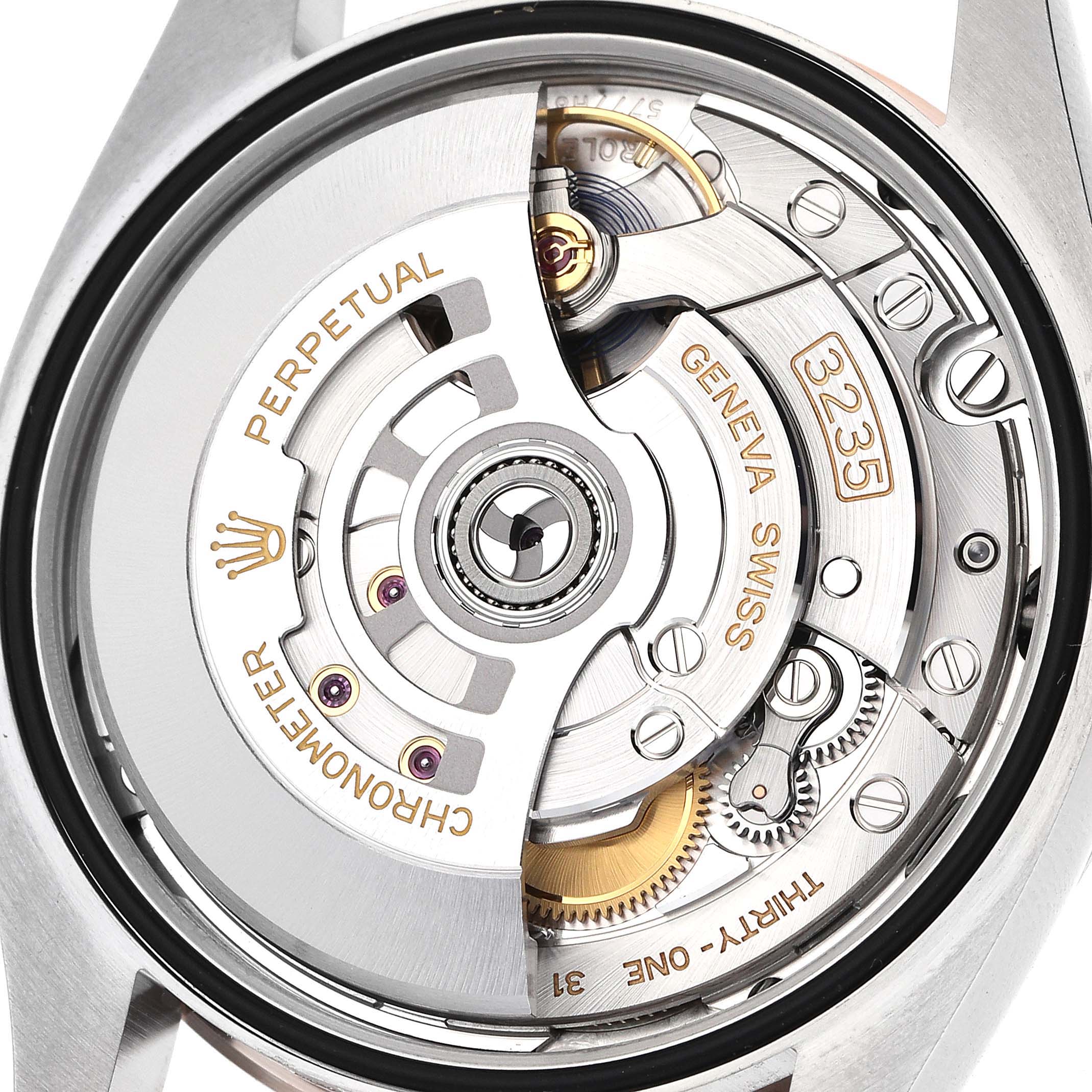 This image shows the back view of the Rolex Datejust 126201 Men's Steel and Gold (two tone) Grey Dial, highlighting its intricate movement and components.