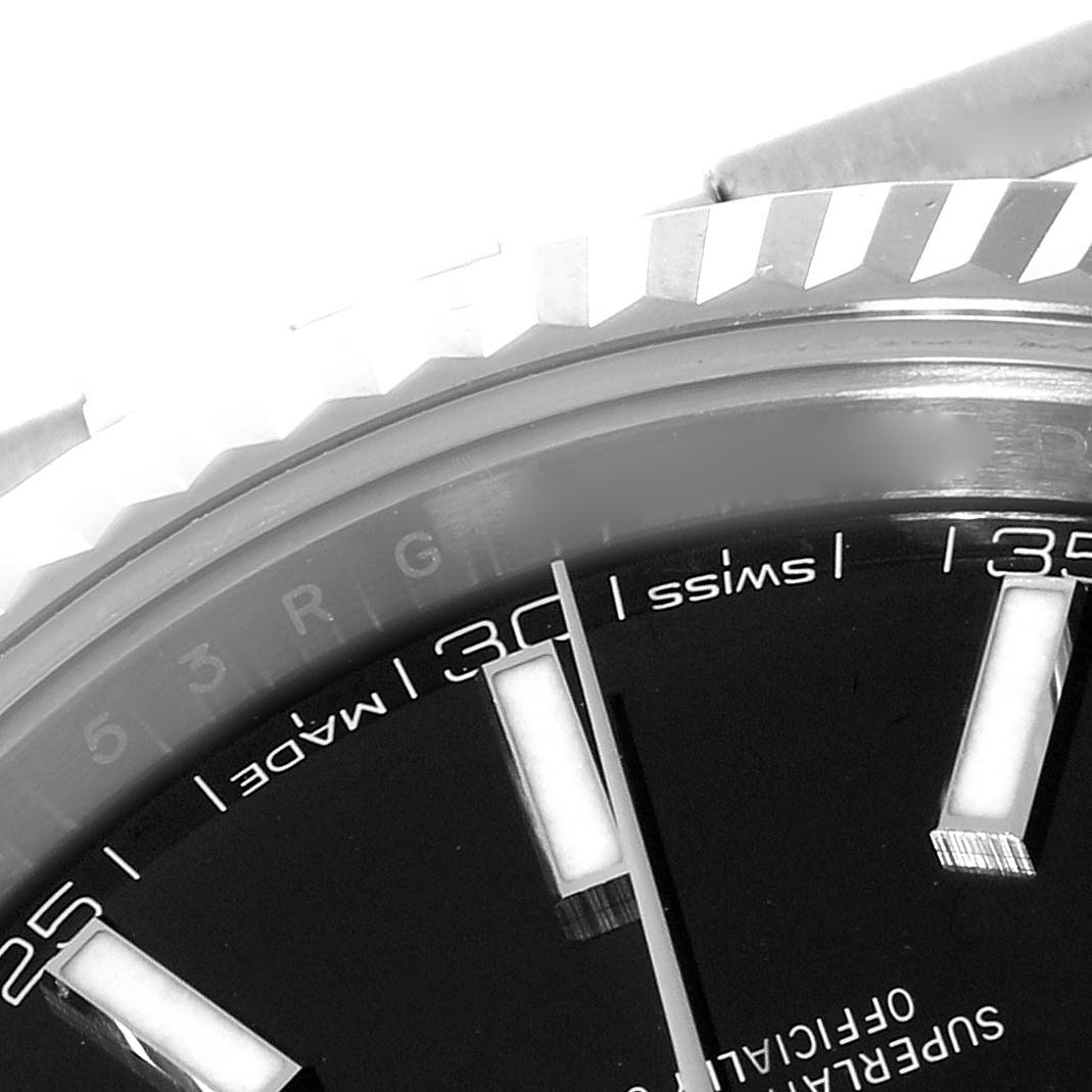 This image shows a close-up of the dial, bezel, and hour markers of a Rolex Datejust 41 126334 Men
s Stainless Steel Black Dial 126334 Men
s Stainless Steel Black Dial watch.