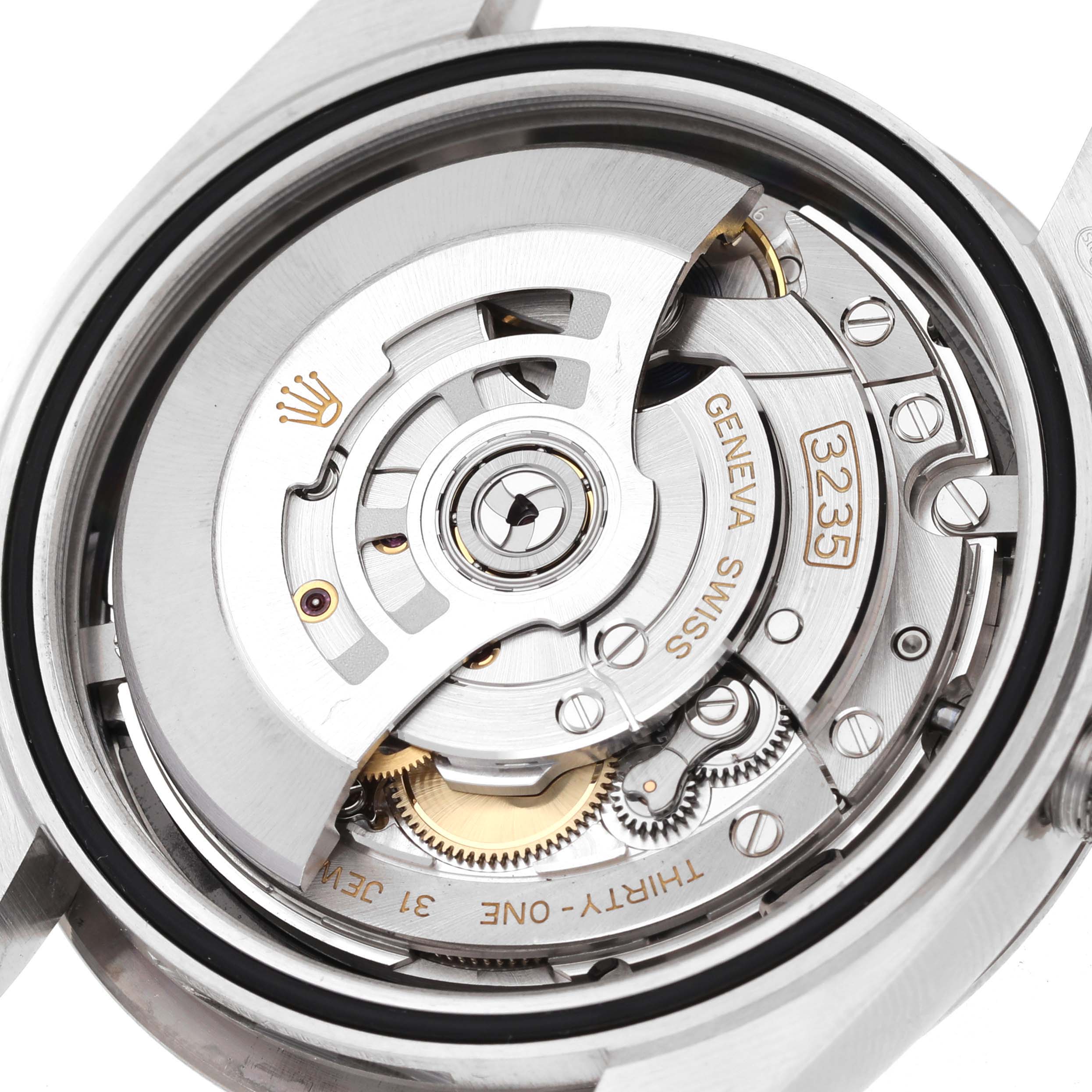 This image shows the detailed movement and internal mechanics of the Rolex Datejust 41 126334 Men
s Stainless Steel Black Dial 126334 Men
s Stainless Steel Black Dial watch from a close-up angle.