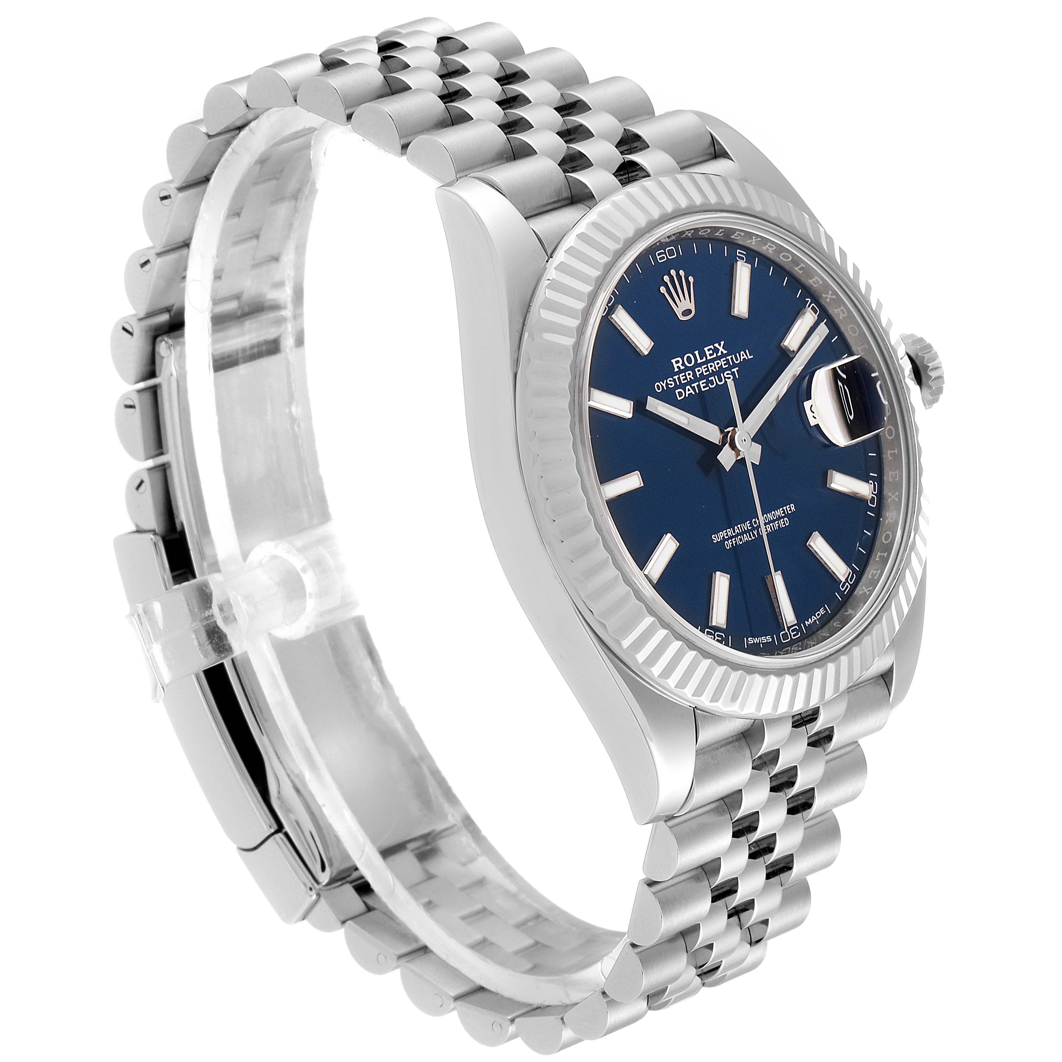 The image shows a side angle of the Rolex Datejust 41 126334 Men's Stainless Steel Blue Dial 126334 Men's Stainless Steel Blue Dial watch, highlighting its blue dial, fluted bezel, and Jubilee bracelet.