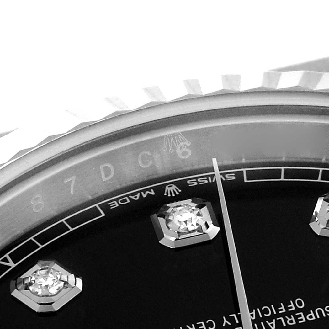 The image shows a close-up angle of the dial and bezel of a Rolex Datejust 41 126334 Men's Stainless Steel Black Dial 126334 Men's Stainless Steel Black Dial, highlighting the markers and part of the second hand.