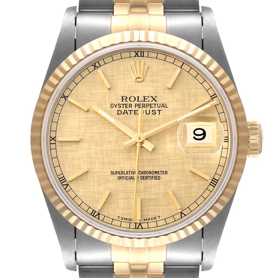 This image shows a front view of the Rolex Datejust watch, highlighting its gold dial, fluted bezel, and date window.