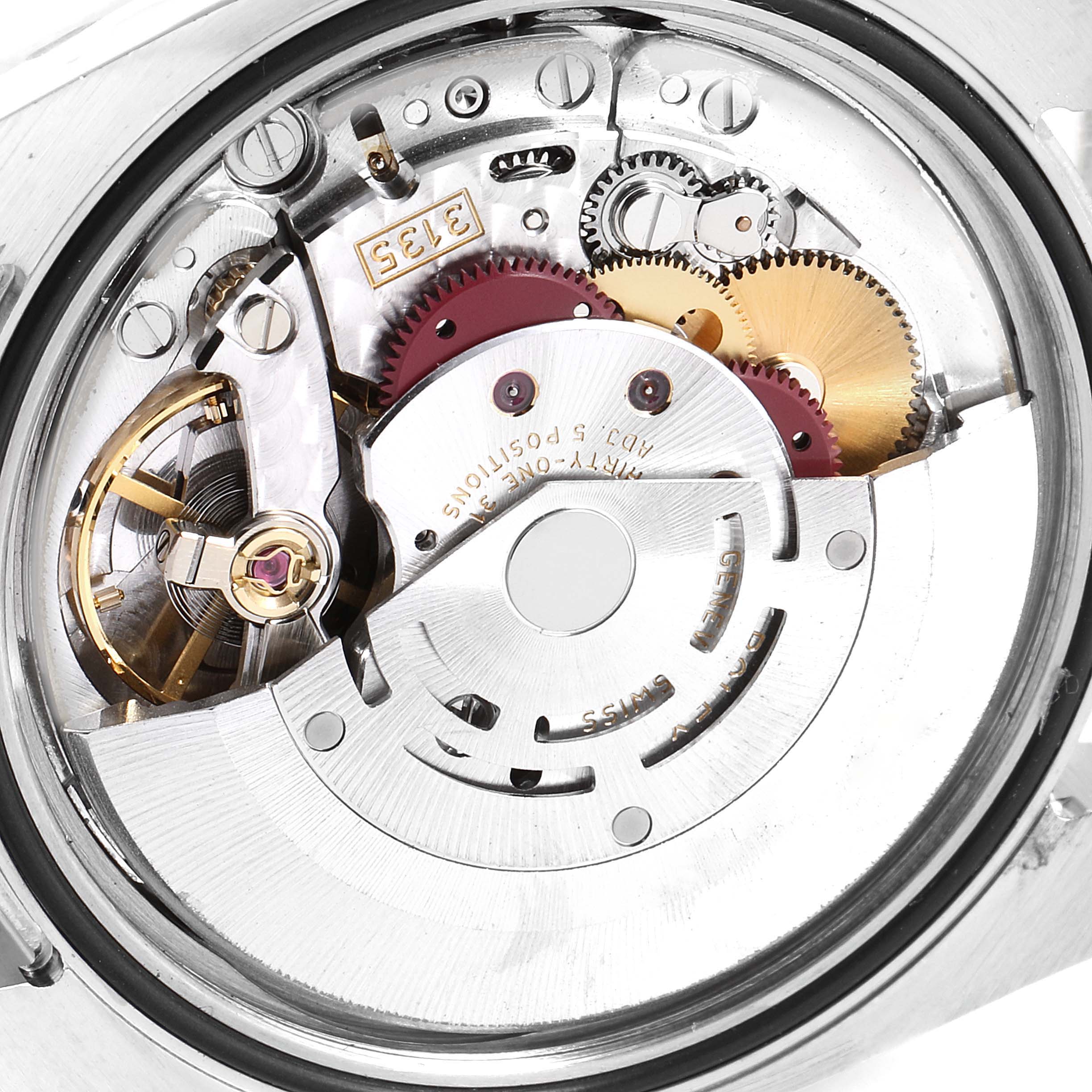 This image shows a close-up view of the internal movement components of a Rolex Datejust 116234 Men's Stainless Steel Silver Dial 116234 Men's Stainless Steel Silver Dial watch.