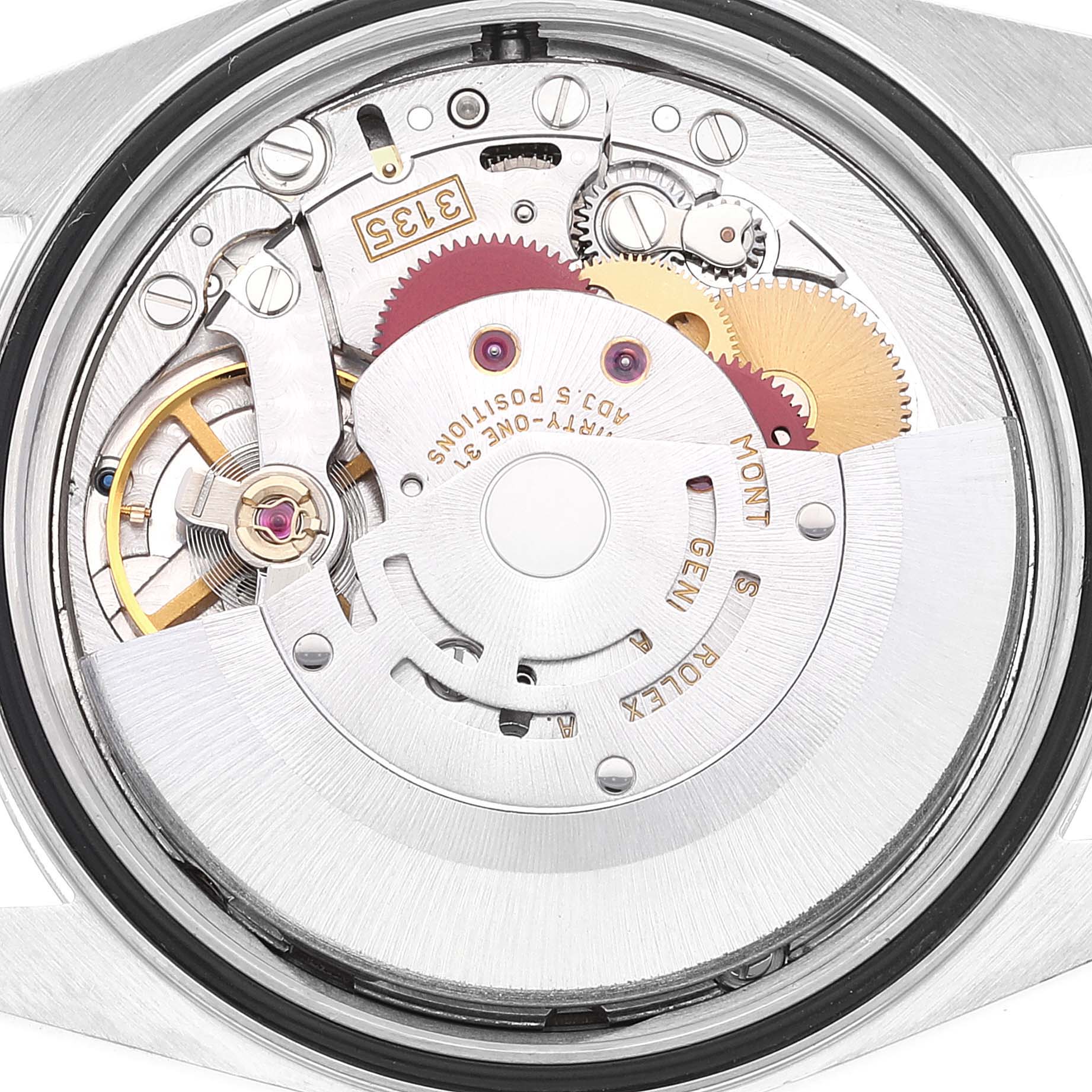 The image shows the inner mechanical movement components of a Rolex Datejust 16234 Men's Stainless Steel Silver Dial 16234 Men's Stainless Steel Silver Dial watch from a top-down angle.