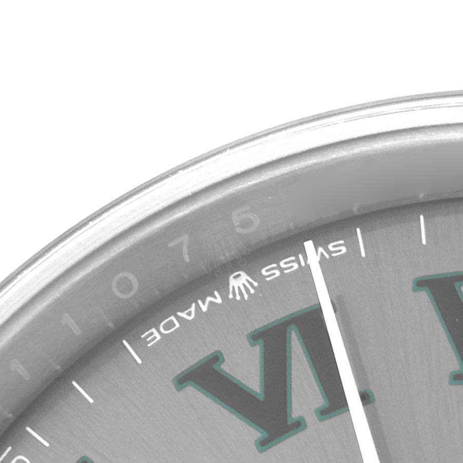 The image shows a close-up of the dial and bezel of the Rolex Datejust 126234 Men's Stainless Steel Grey Dial 126234 Men's Stainless Steel Grey Dial watch, highlighting the "Swiss Made" text and Roman numeral markers.