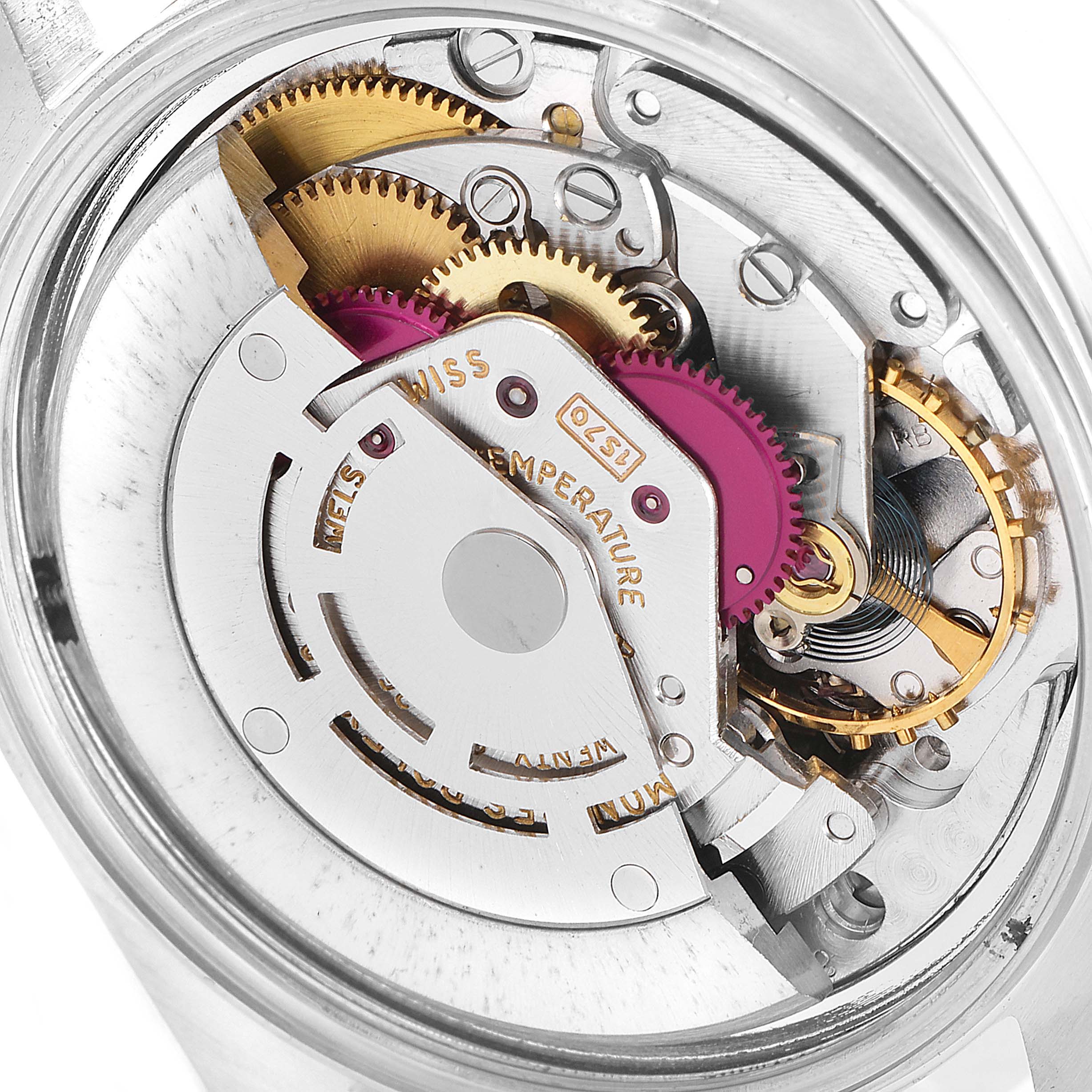 This close-up image shows the intricate internal mechanism of a Rolex Vintage Collection 1601 Men's Steel and Gold (two tone) Champagne Dial 1601 Men's Steel and Gold (two tone) Champagne Dial model watch.