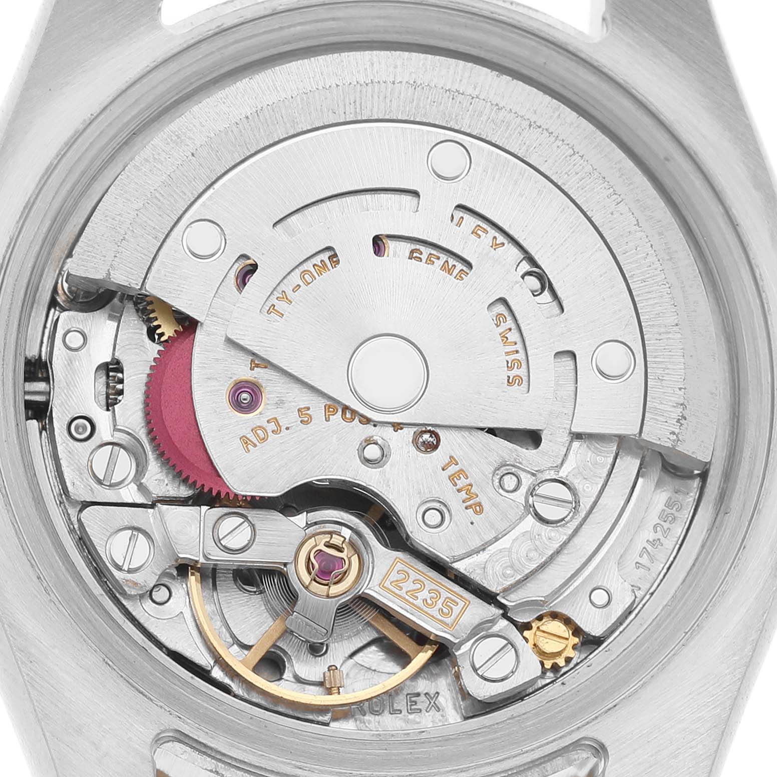 The image shows the movement mechanism of the Rolex Datejust 179173 Women's Steel and Gold (two tone) Champagne Dial watch, focusing on the intricate internal components from the back.