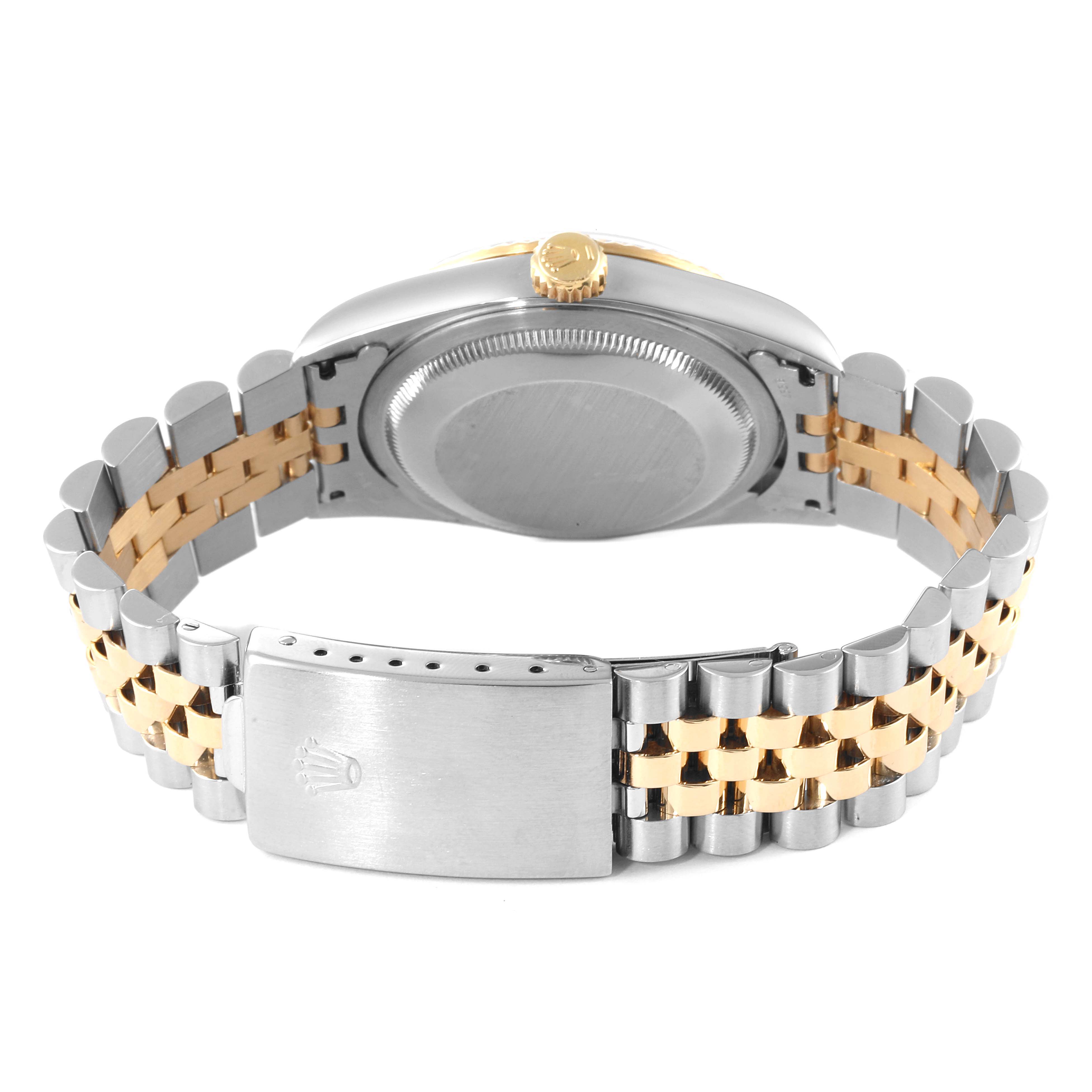 The image shows the back case and bracelet of a Rolex Datejust 16233 Men's Steel and Gold (two tone) Champagne Dial 16233 Men's Steel and Gold (two tone) Champagne Dial watch, displaying its two-tone metal finish.