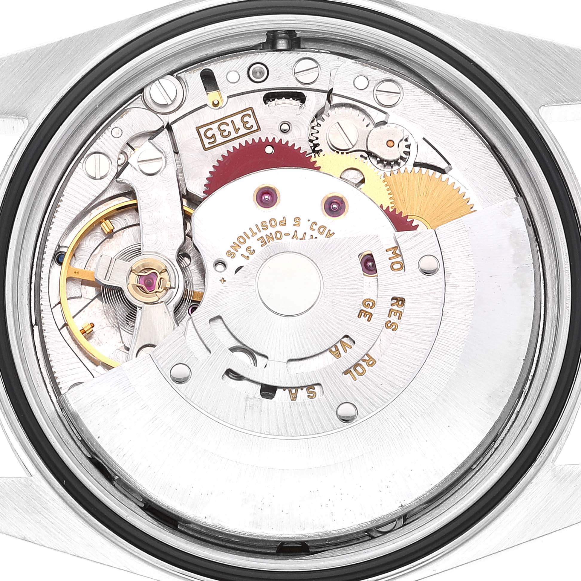 This image shows the intricate internal mechanism of the Rolex Datejust 16233 Men's Steel and Gold (two tone) Champagne Dial 16233 Men's Steel and Gold (two tone) Champagne Dial watch, capturing the movement from a top-down angle.