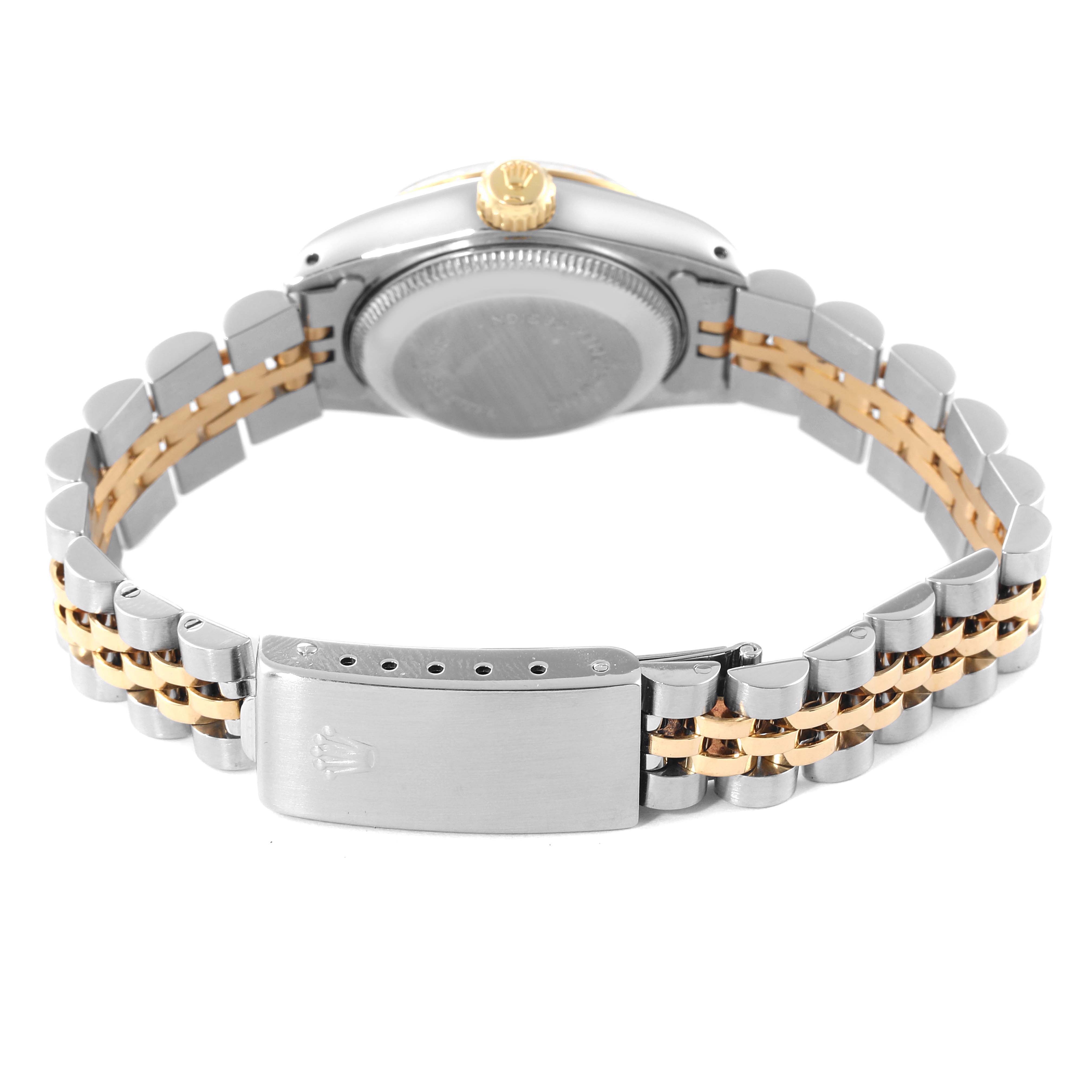 This image shows the backside of a Rolex Datejust 69173 Women's Steel and Gold (two tone) Champagne Dial 69173 Women's Steel and Gold (two tone) Champagne Dial watch and its two-tone metal bracelet.