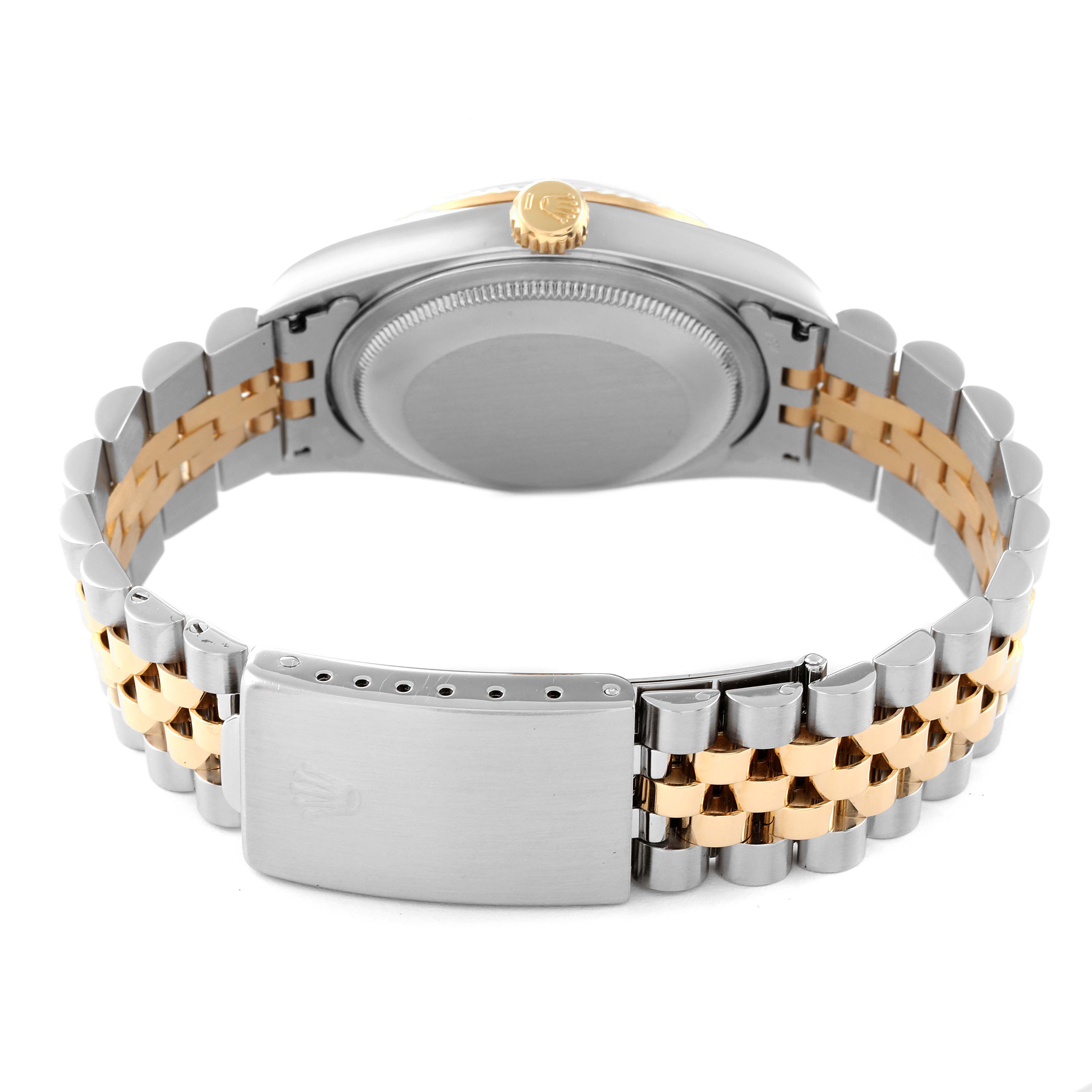 This image shows the back case and bracelet of a Rolex Datejust 16233 Men
s Steel and Gold (two tone) Grey Dial 16233 Men
s Steel and Gold (two tone) Grey Dial watch from a rear angle.