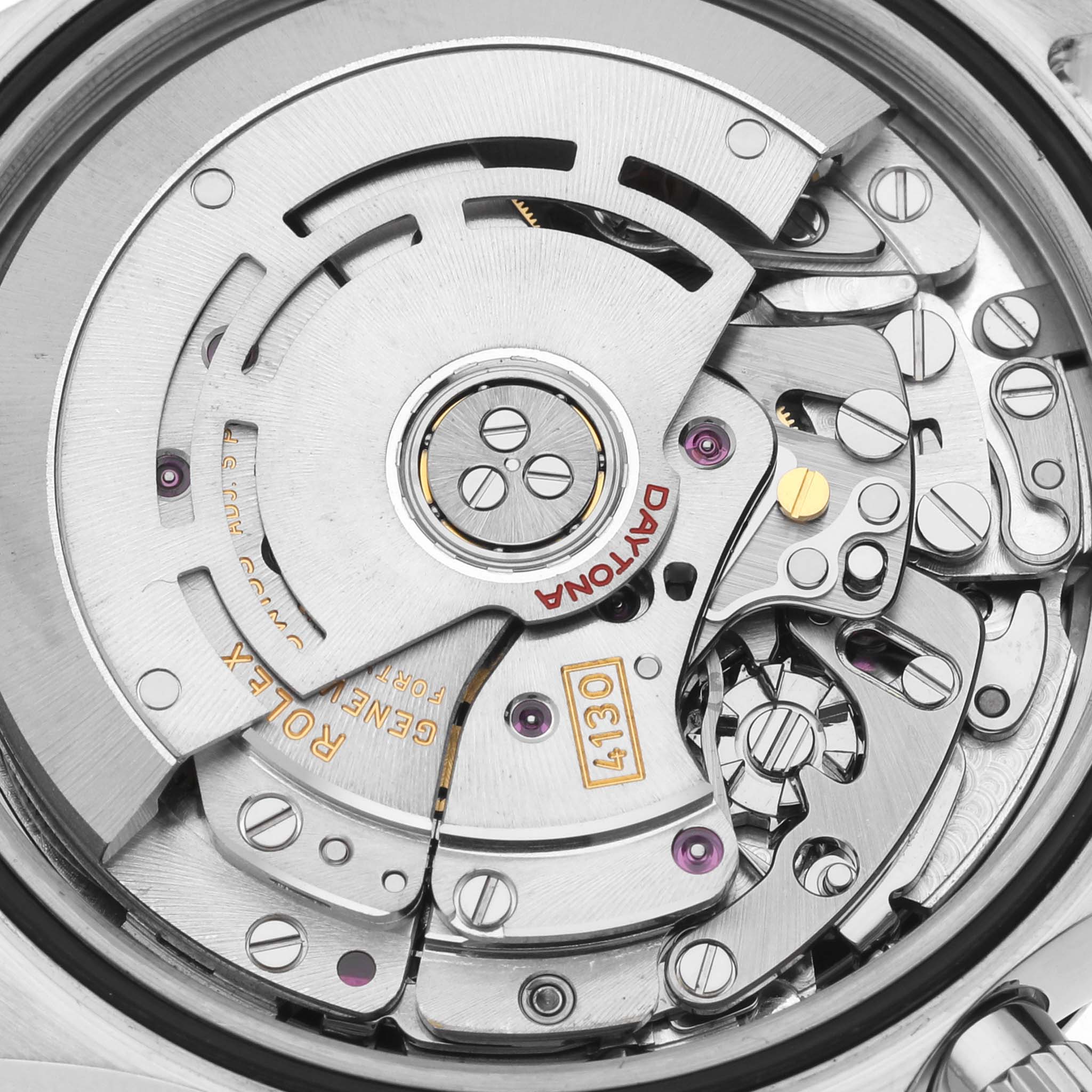 This image shows the intricate movement and inner mechanics of a Rolex Daytona 116520 Men's Stainless Steel White Dial 116520 Men's Stainless Steel White Dial watch from a close-up angle.