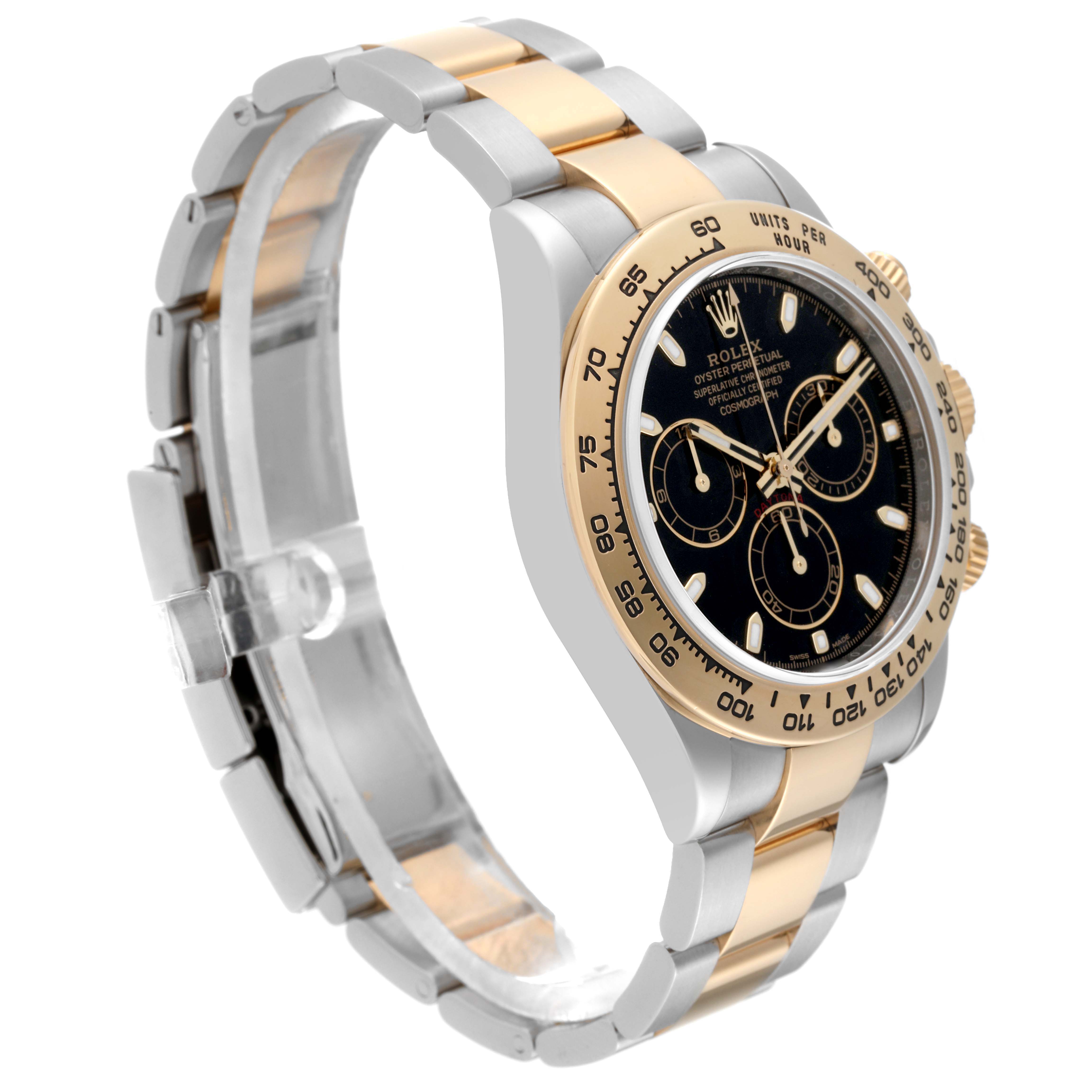 The image shows a side angle of a Rolex Daytona 116503 Men's Steel and Gold (two tone) Black Dial 116503 Men's Steel and Gold (two tone) Black Dial watch, displaying the dial, bezel, and part of the bracelet.