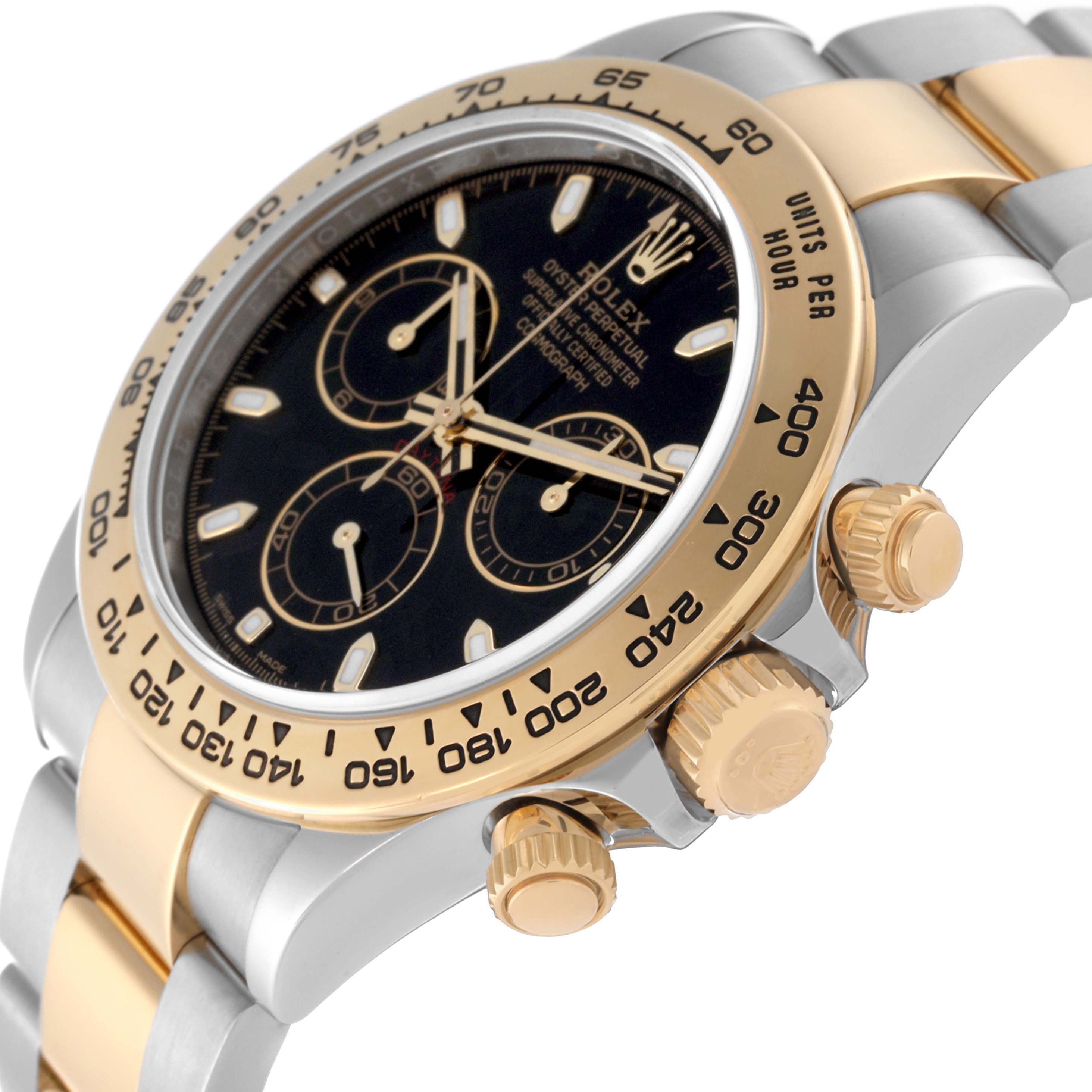 This image shows a close-up side angle of a Rolex Daytona 116503 Men's Steel and Gold (two tone) Black Dial 116503 Men's Steel and Gold (two tone) Black Dial watch highlighting the bezel, crown, pushers, and part of the bracelet.