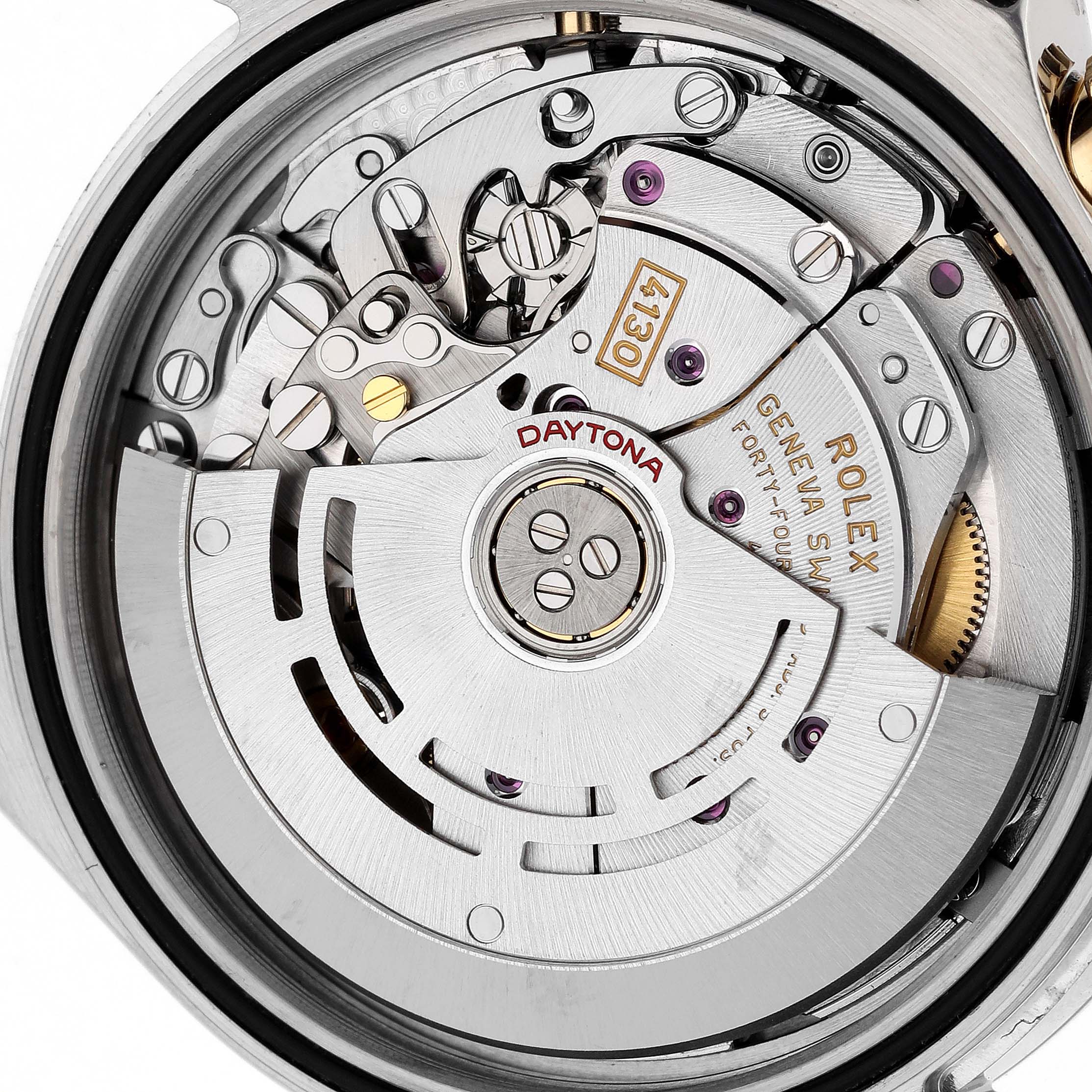 This image shows the inner mechanical movement of a Rolex Daytona 116503 Men
s Steel and Gold (two tone) Black Dial 116503 Men
s Steel and Gold (two tone) Black Dial watch, highlighting components and the "Daytona" branding.