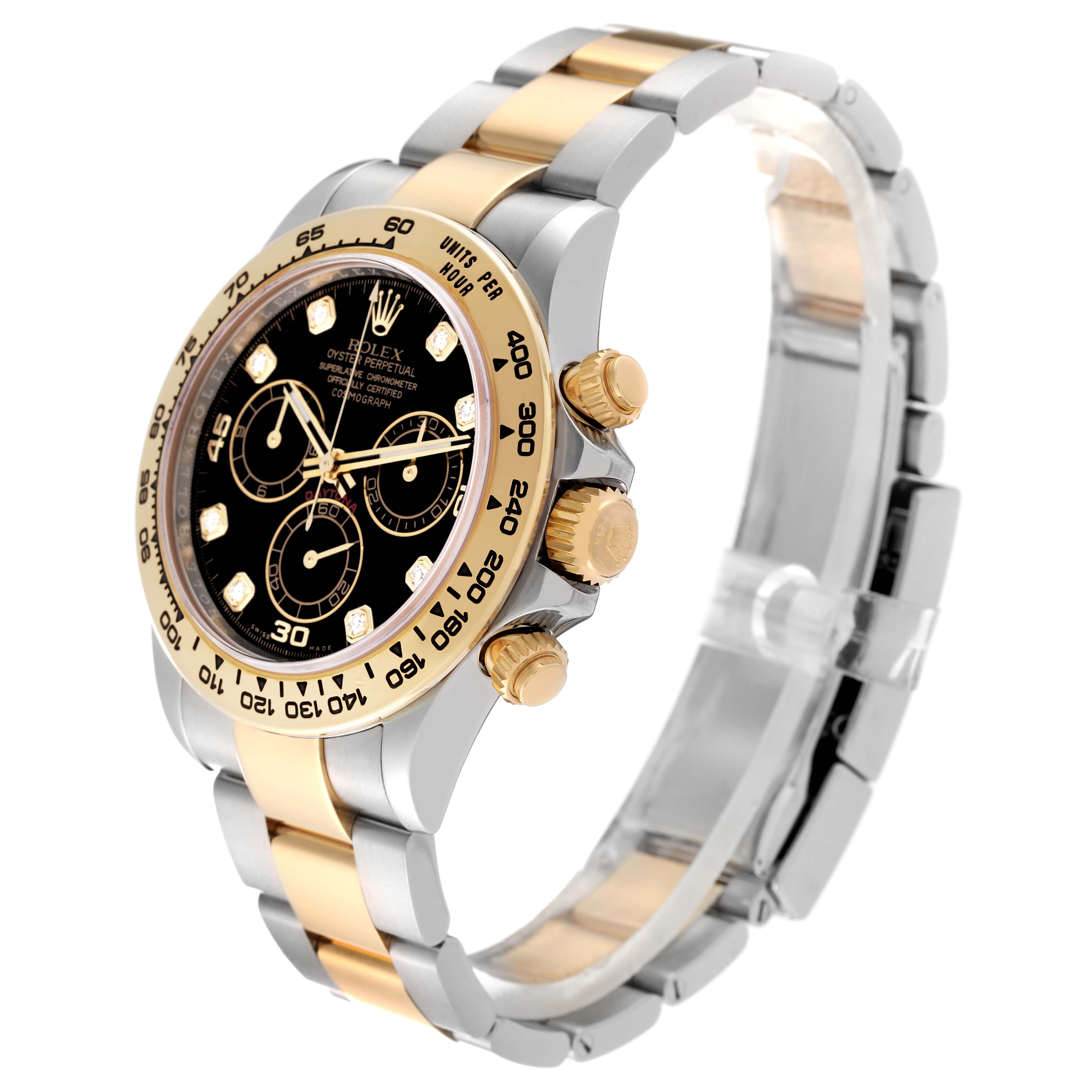 The Rolex Daytona 116503 Men
s Steel and Gold (two tone) Black Dial 116503 Men
s Steel and Gold (two tone) Black Dial watch is shown at a three-quarter angle, displaying its black dial, bezel, chronograph buttons, and two-tone bracelet.