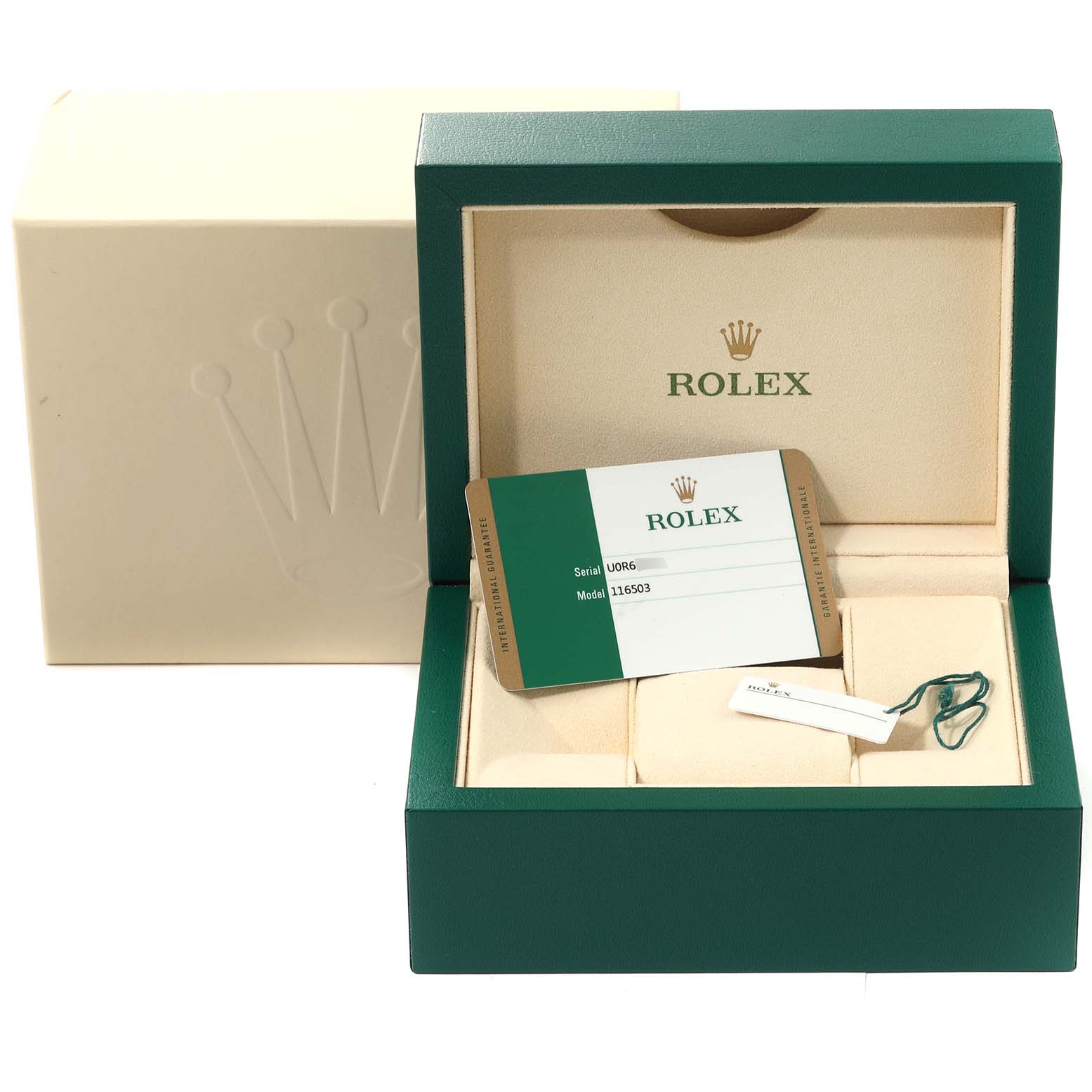 The image shows the open box of a Rolex Daytona 116503 Men
s Steel and Gold (two tone) Black Dial 116503 Men
s Steel and Gold (two tone) Black Dial watch, including a guarantee card, tag, and outer packaging.
