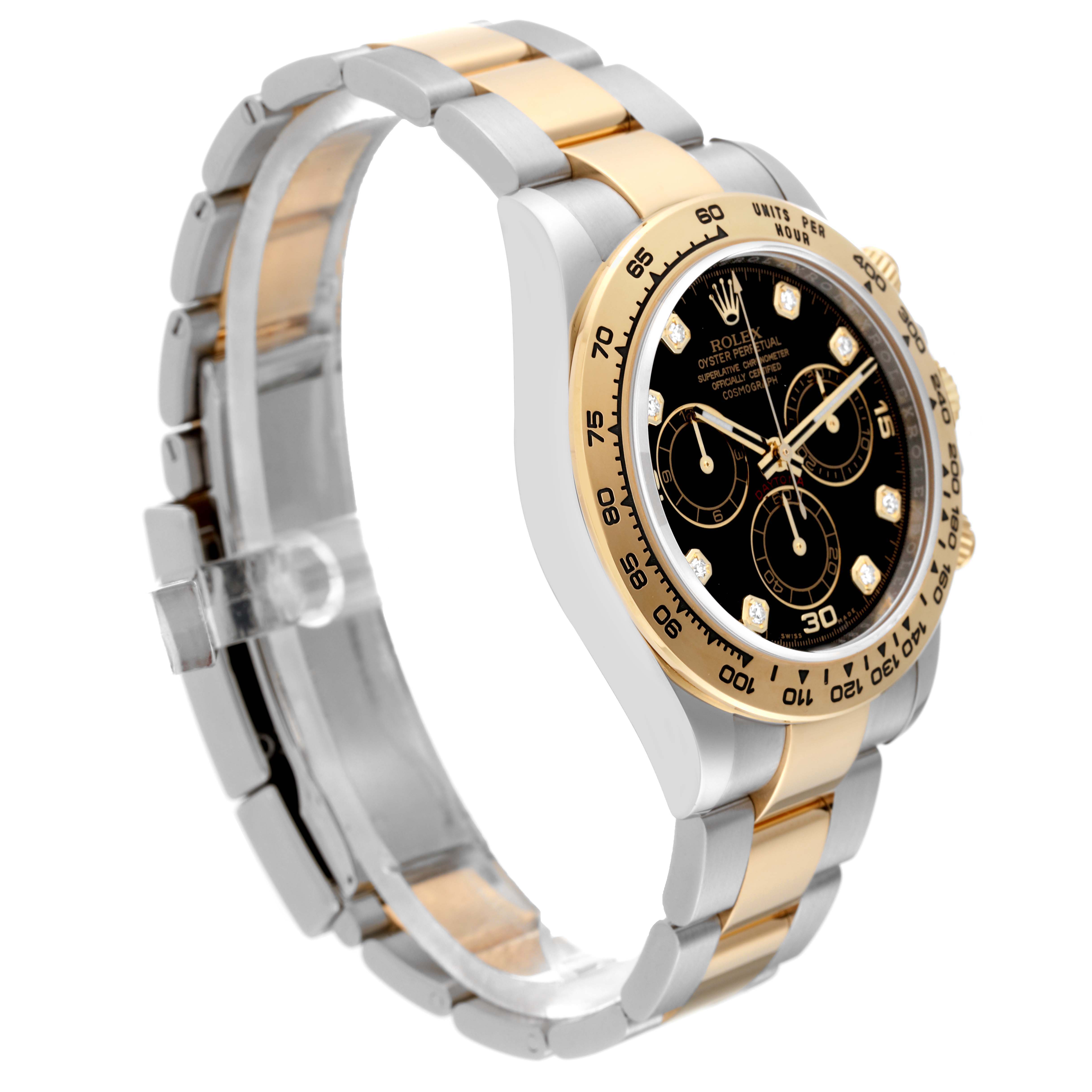 The Rolex Daytona 116503 Men
s Steel and Gold (two tone) Black Dial 116503 Men
s Steel and Gold (two tone) Black Dial watch is shown from a side angle, highlighting the two-tone metal bracelet and black dial with subdials.
