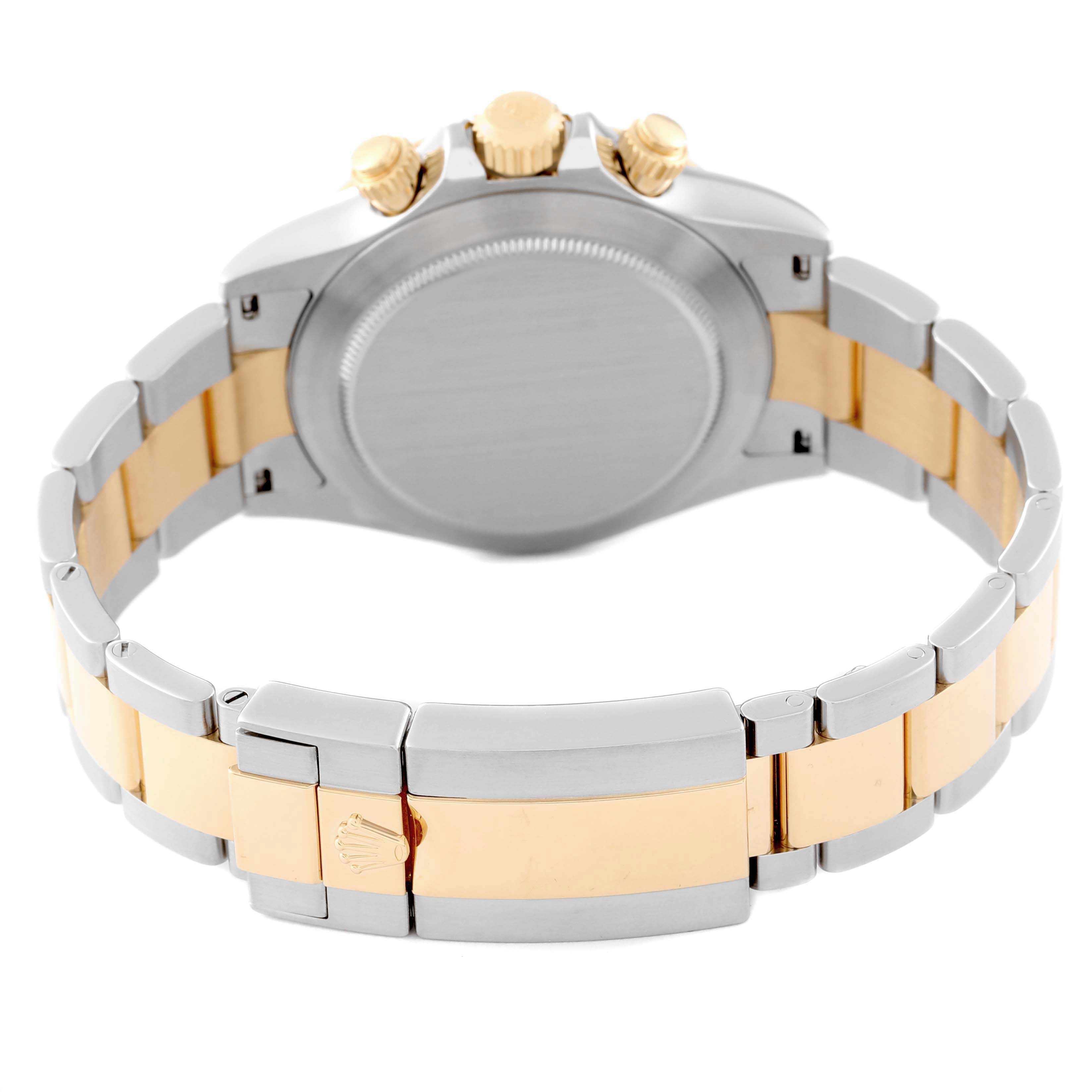 The image shows the back view of a Rolex Daytona 116503 Men
s Steel and Gold (two tone) Black Dial 116503 Men
s Steel and Gold (two tone) Black Dial watch, highlighting the case back, crown, pushers, and bi-tone bracelet clasp.