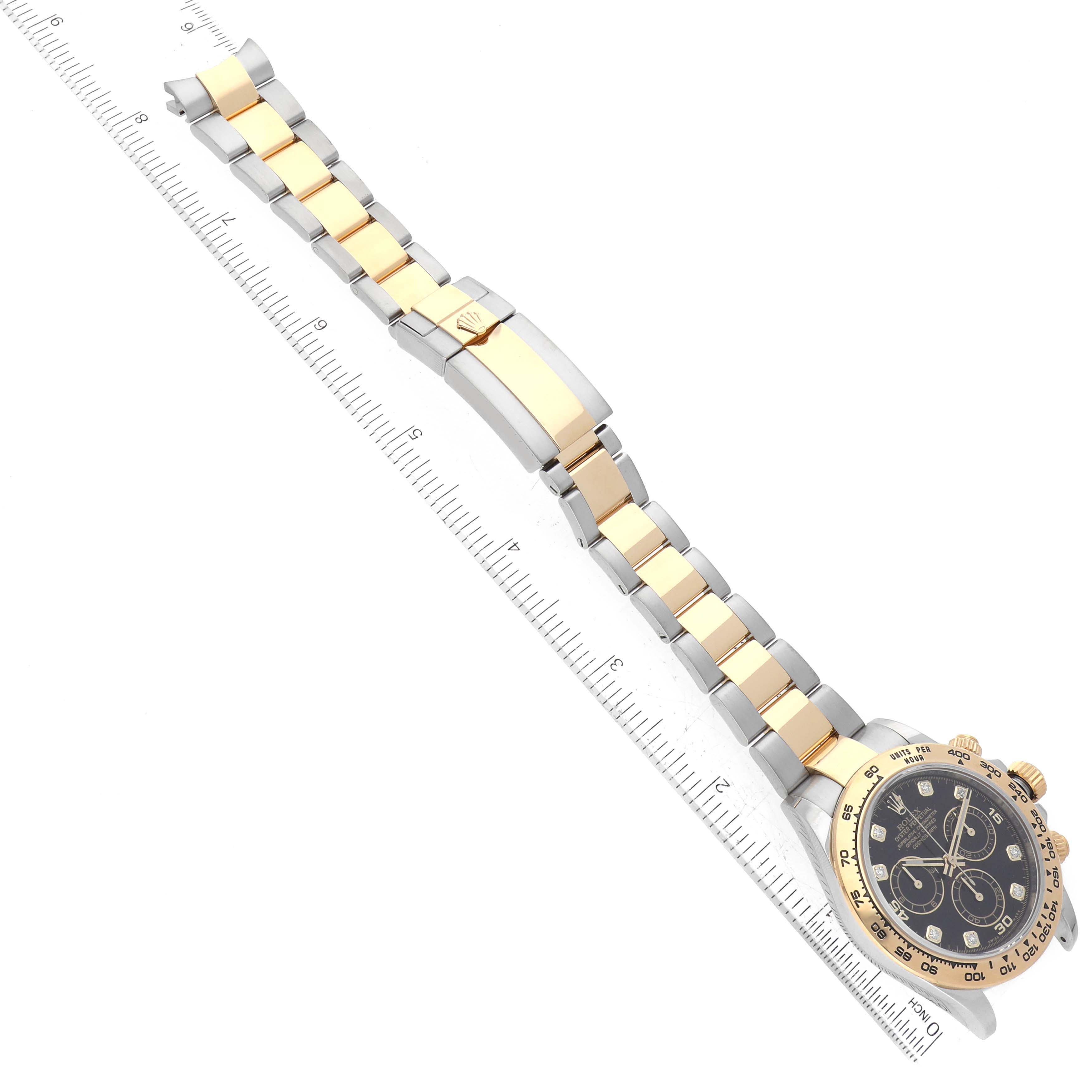 This image shows a full, angled view of a Rolex Daytona 116503 Men
s Steel and Gold (two tone) Black Dial 116503 Men
s Steel and Gold (two tone) Black Dial model watch, highlighting its bracelet and dial.