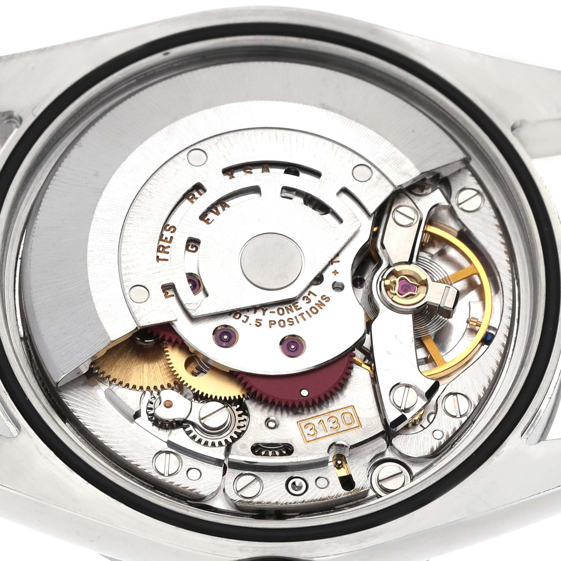 The image shows the movement of a Rolex Explorer 114270 Men's Stainless Steel Black Dial watch at an angle displaying its intricate mechanism and internal components.