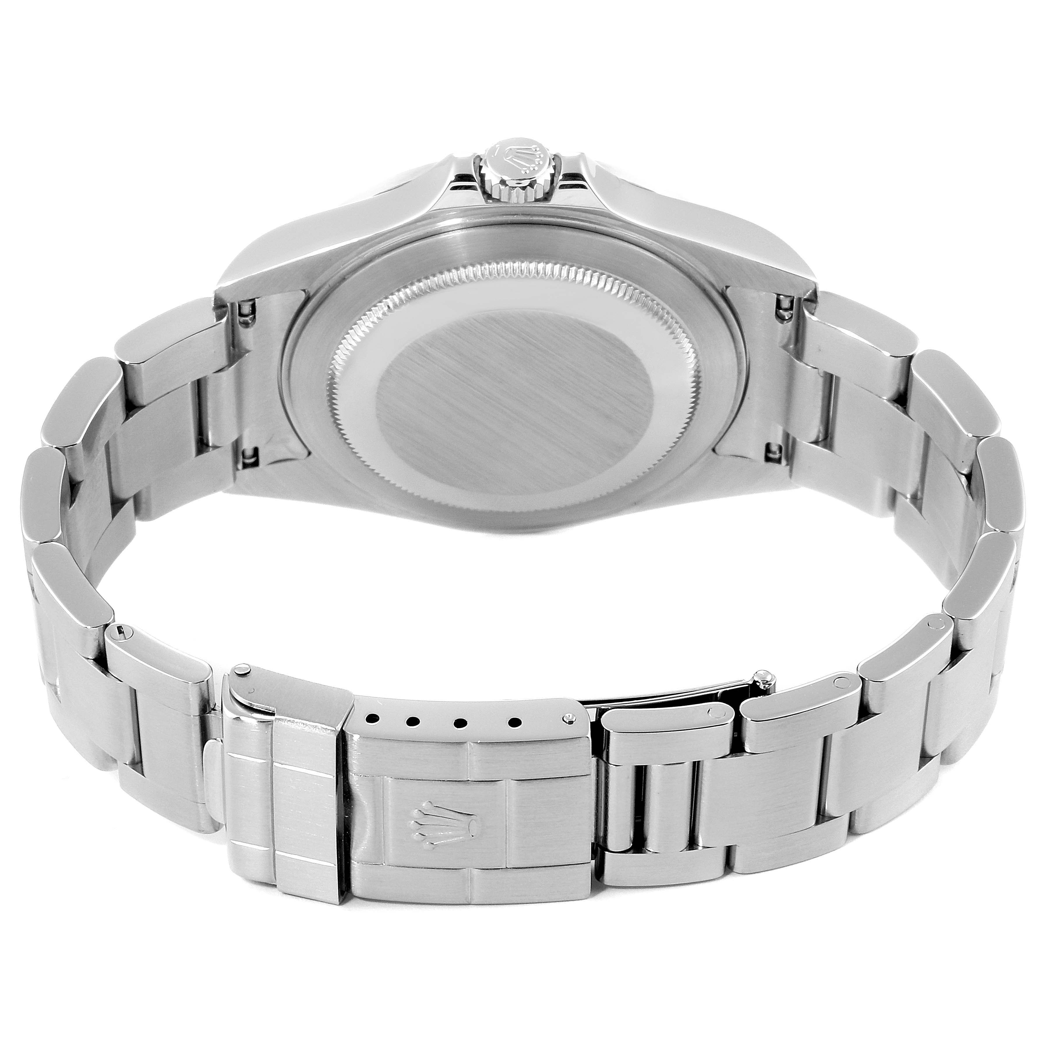 The image shows the back view of a Rolex Explorer 16570 Men's Stainless Steel White Dial 16570 Men's Stainless Steel White Dial watch, highlighting its caseback, bracelet, and clasp.