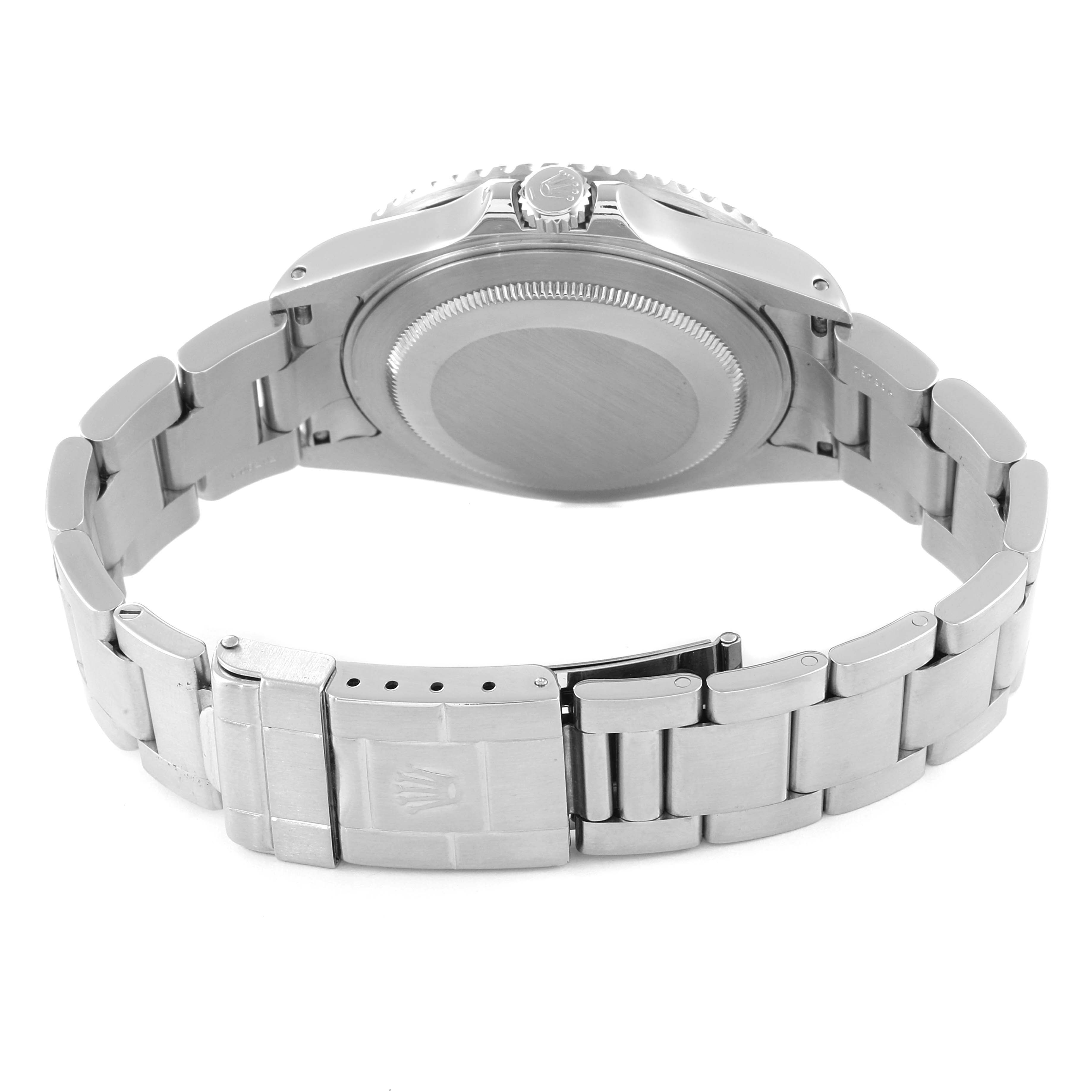 The image shows the back view of the Rolex GMT-Master 16710 Men's Stainless Steel Black Dial 16710 Men's Stainless Steel Black Dial watch, highlighting its case back and metal bracelet with the clasp open.