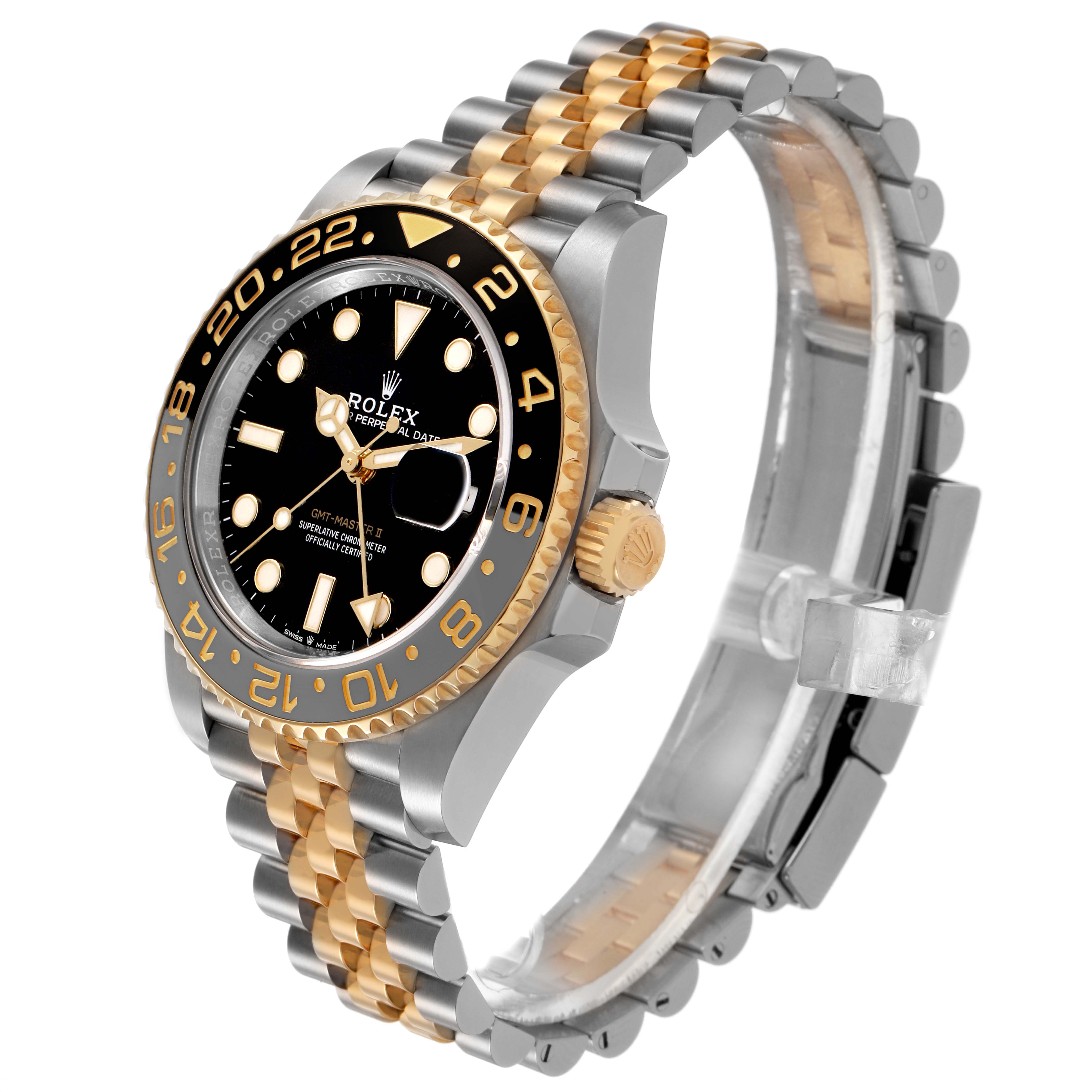 The image shows the Rolex GMT-Master 126713GRNR Men's Steel and Gold (two tone) Black Dial watch at a three-quarter angle, highlighting the bezel, dial, jubilee bracelet, and crown.