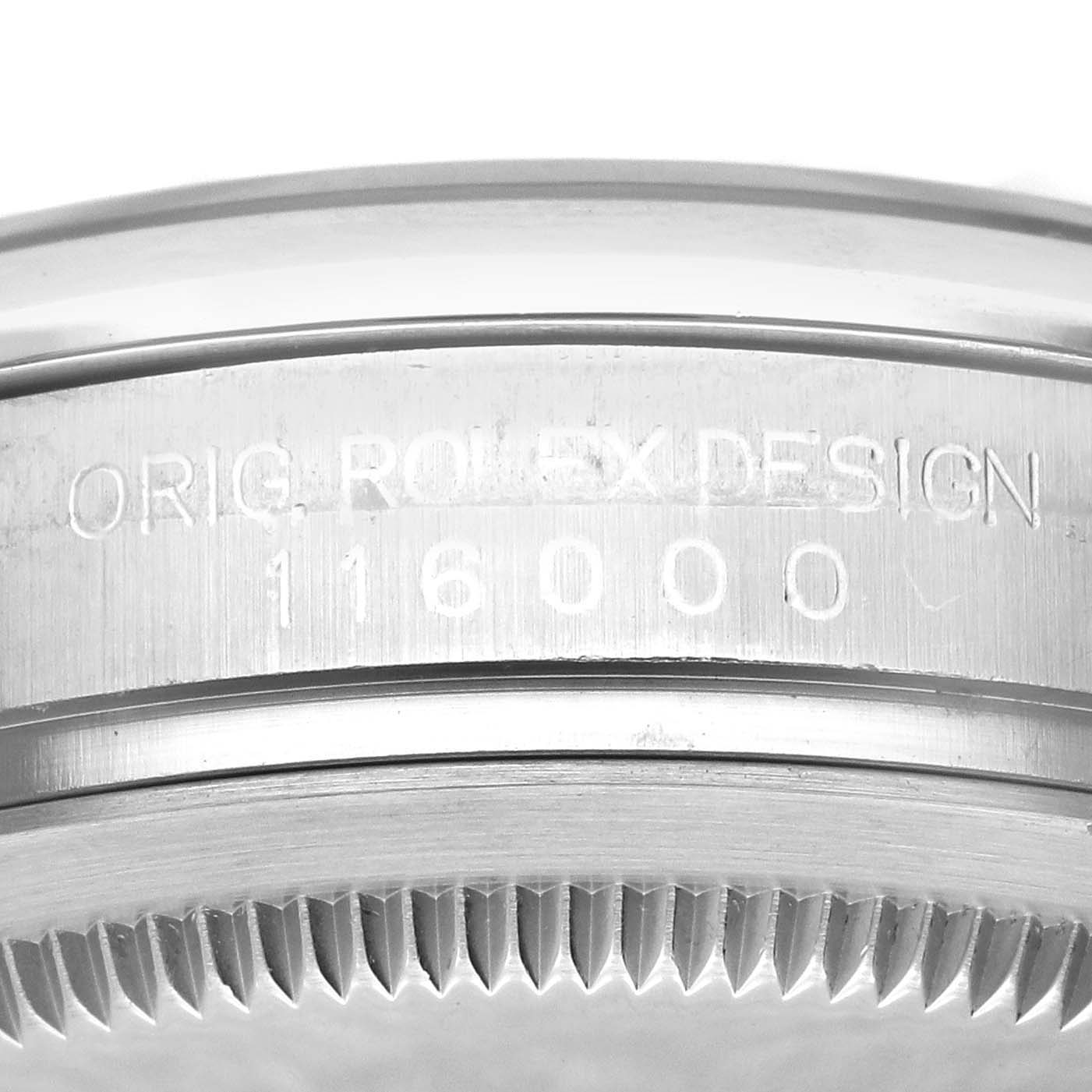 Close-up of the side and caseback of a Rolex Oyster Perpetual 116000 Men's Stainless Steel Grey Dial 116000 Men's Stainless Steel Grey Dial watch, showing the engraved model number 116000.