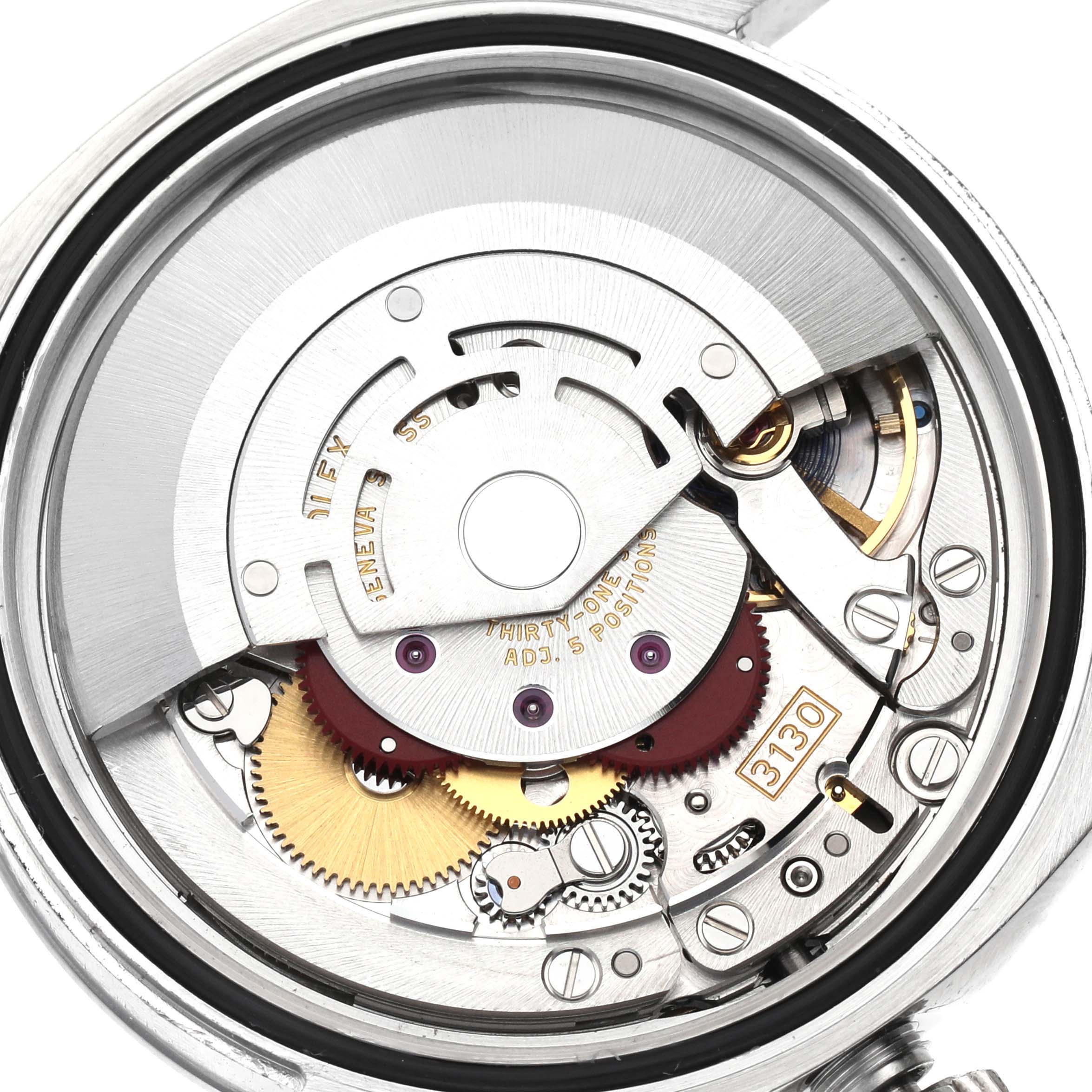 This is an internal view of the Rolex Oyster Perpetual 116000 Men's Stainless Steel Blue Dial 116000 Men's Stainless Steel Blue Dial model, showcasing the watch's movement and mechanical components.